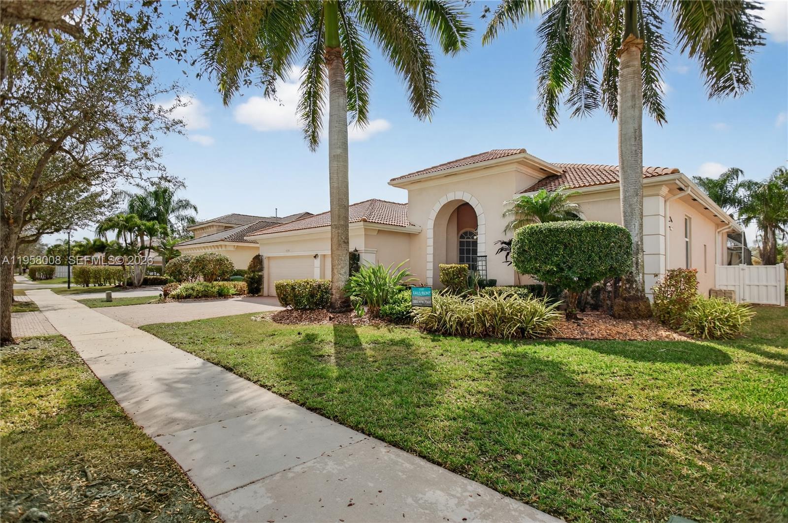 Beautiful 5 Beds 3.5 baths home located in a Gated Community Laguna Isles. This home features new landscaping, Laminate Wood Floors, Title Kitchen, Granite Countertop, Stainless Steel Appliances, Fresh Paint and Carpet, Spacious Screened Patio with Pool and Hot Tub. The Laguna Isles community offers a family-friendly setting with resort-style amenities, including a clubhouse, pool, fitness center, tennis courts, and playground. Enjoy tree-lined streets, lake views, and well-maintained common areas, all close to top-rated schools, such as Manatee Bay, Falcon Cove Middle School, Cypress Bay High School, shopping, and major highways—perfect for comfortable South Florida living.