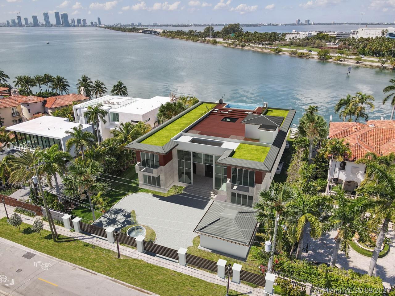 Rare opportunity to own your dream home on prestigious North Bay Road.  Price reflects the lot, building permits, architectural plans and shell of the home. This extraordinary waterfront property offers a stunning panoramic view of downtown Miami. Enjoy unobstructed ocean access and 100 feet of water frontage while boasting an expansive 11,649 of luxurious living space designed by award winning architect to uniquely capture the essence of all the elements.  Images displayed are only reflecting the visualization of the architectural plans (as per existing building permit). !0 Ft buffer Zone on left side of the property from street. Prince is non-negotiable.
