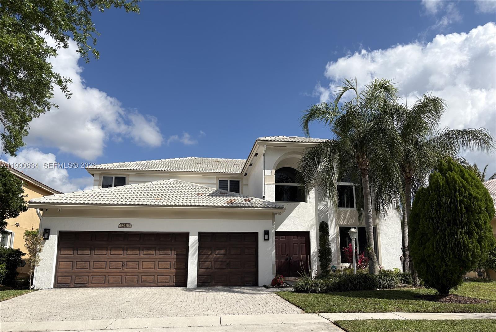 Welcome to this stunning modern lakefront Kingston model in the prestigious gated community of PEMBROKE FALLS! This beautifully maintained home offers 4 bedrooms plus a versatile MEDIA ROOM (easily a 5th bedroom) and 3.5 baths, designed for both comfort and style.

Step inside to a bright, open floor plan filled with natural light, featuring elegant porcelain tile and wood floors throughout. The spacious kitchen is the heart of the home, complete with granite countertops, a large island, and plenty of cabinetry—perfect for entertaining family and friends. Enjoy movie nights or game days in your private media room with BOSE surround sound.

The primary suite is conveniently located on the first floor, offering privacy and ease of living. HIGH IMPACT WINDOWS and sliding doors provide peace of mind and energy efficiency.

Step outside to your own private oasis—a screened-in pool overlooking breathtaking lake views, all set on an oversized lot with fruit trees, perfect for relaxing or entertaining year-round.

Located in a resort-style gated community with 24/7 security, clubhouse, and top-tier amenities. HOA INCLUDES CABLE, HIGH- SPEED INTERNET, and ALARM.

This is South Florida living at its finest—don’t miss the opportunity to make it yours!