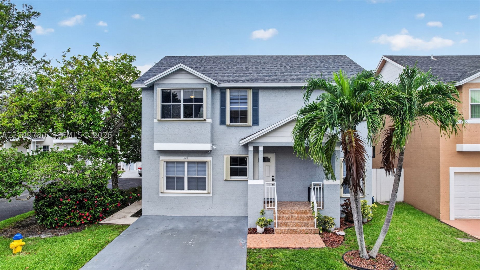 Welcome home to this beautifully updated 5-bedroom, 3-bath home nestled in a gated Pembroke Pines community! With a spacious layout that includes a first-floor bedroom and full bath, there's plenty of room for family, guests, or a home office. You'll love the updated kitchen with newer appliances, refreshed bathrooms, vaulted ceilings in the primary suite, and an indoor laundry room with extra storage. Step outside to a low-maintenance backyard with artificial turf, a storage shed, and plenty of space for relaxing or entertaining. Accordion hurricane shutters provide added peace of mind. Major updates include a 2019 roof, 2019 water heater, and a 2024 A/C. The low $175/month HOA covers front lawn maintenance, tree trimming, sprinklers, and access to the community pool. Best of all, there's no HOA approval required—just move in and start making memories!