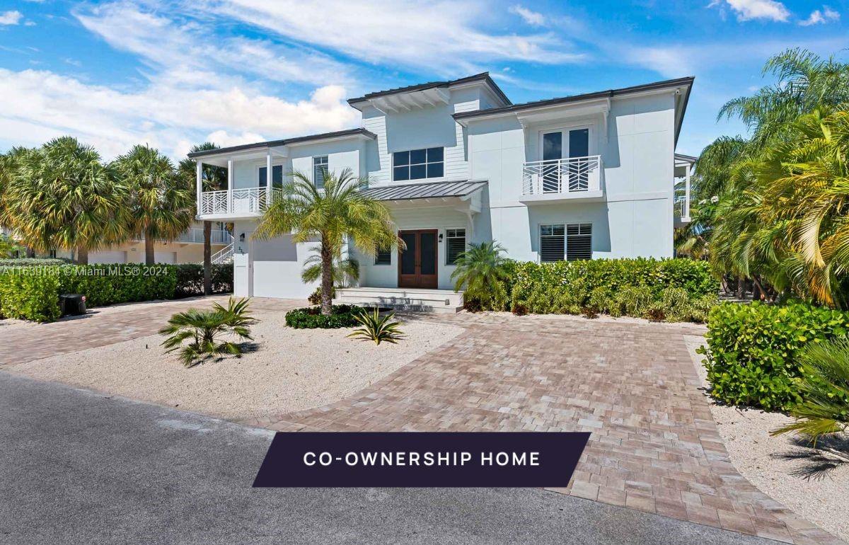 Seller Incentive: The seller is offering a 1-year rate buy-down!
New co-ownership opportunity: Own one-eighth of this professionally managed, turnkey home by Pacaso. Blue skies and waterways await at Sunset Park. This Key Colony Beach retreat offers access to the Gulf of Mexico and the Atlantic. Less than an hour from Key West airport, this gated community is perfect for a serene family getaway. Enjoy included bikes, nearby Pickleball and Tennis courts, and an outdoor kitchen with a pool and patio. The gourmet kitchen features Thermador appliances. The upstairs family room has a wet bar and canal views. Four additional bedrooms complete the home.