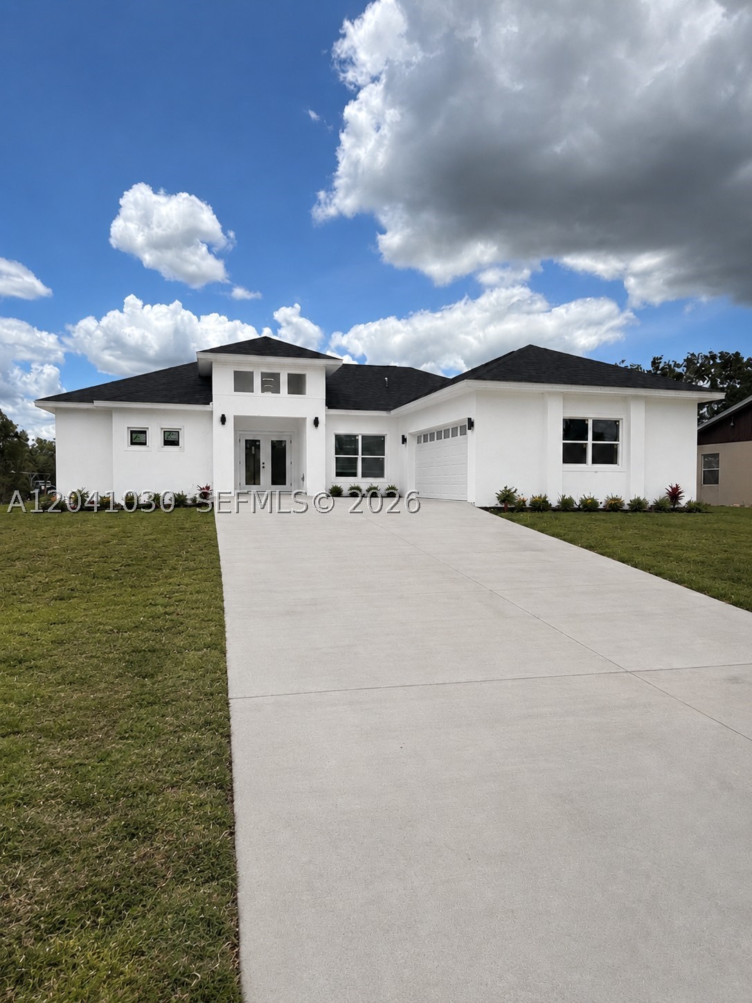 Welcome to this pristine, move-in-ready home that blends modern style, generous space, and comfortable living. With 3 spacious bedrooms, 2 well-appointed bathrooms, and a dedicated home office or den, the smart floor plan makes the most of its bright, open layout.
The open-concept kitchen serves as the heart of the home, featuring high-end finishes, sleek countertops, and a large center island that connects effortlessly to the living and dining areas—ideal for entertaining. The flexible den offers a quiet space for work, study, media, or guests.
Everyday convenience meets upscale comfort with an indoor laundry room and attached two-car garage with ample storage. Set in a quiet, highly desirable neighborhood, the home is just minutes from Lake Placid’s lakes, local schools, and outdoor recreation.