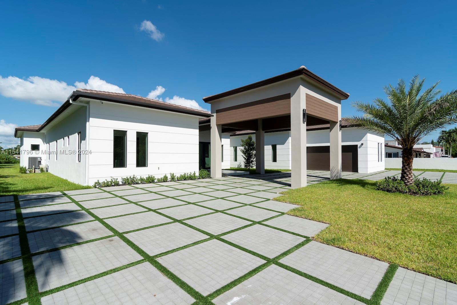 This custom-designed new construction home showcases modern architecture while delivering timeless style. The
Home Features 5 bedrooms, 5 full bathrooms + half bathroom, and a 6447 sqft Coverage area over a 35000
square foot lot in the prestigious Belen area. This stunning smart home offers sprawling spaces for family
gatherings and entertaining. Enjoy a large, covered patio space, offset with a modern pool with SPA and Heather
Automation System for the ultimate South Florida living experience. A Bonus Guest House with a full Bathroom.