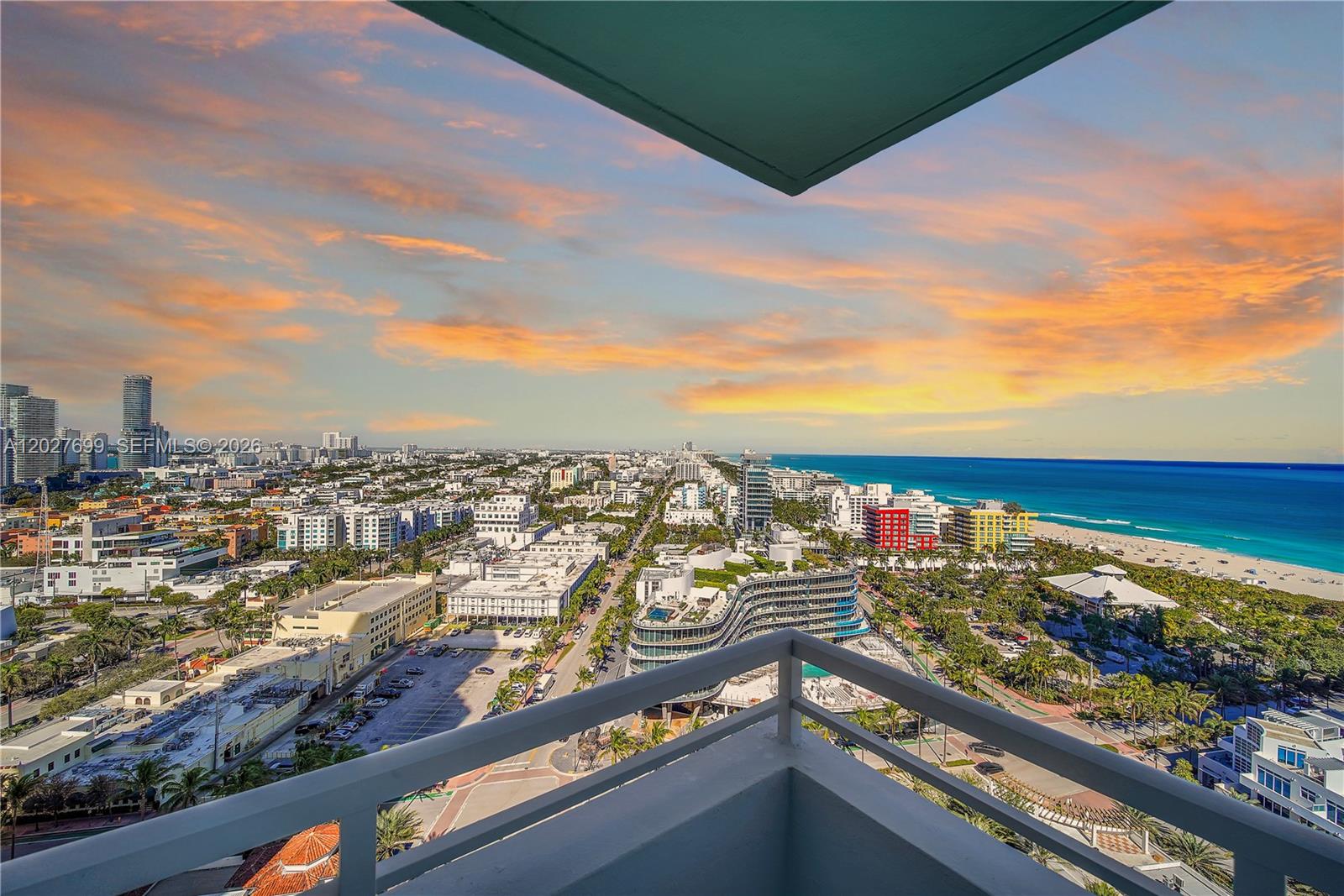 Extraordinary one-of-a-kind corner SKY LOFT at the iconic South Pointe Tower offers an unparalled Miami Beach experience. Originally a 2 bed+den, it has been masterfully transformed into a dramatic open-concept LOFT maximizing scale, light + breathtaking views. Floor to ceiling glass walls frame sweeping vistas of the ocean, Government Cut, Fisher Island + the dazzling Miami skyline. Bathed in natural light, the interiors showcase white glass floors, elegant Carrara marble finishes + a spectacular 15-foot marble island anchoring the chef's kitchen—an entertainer's dream. Every room opens to a 90-foot wraparound terrace, creating seamless indoor-outdoor living + providing a front-row seat to spectacular sunrises, passing yachts + cruise ships, and glittering city lights.  The spa-inspired bathrooms are finished in classic marble, offering a sophisticated private retreat.  Perfectly positioned in the coveted South of Fifth neighborhood, residents enjoy direct access to South Pointe Park, world-class dining, marinas, pristine beaches, and Miami Beach's sought-after lifestyle. South Pointe Tower has recently completed a fully paid $32 million renovation, further enhancing one of South Florida's premier oceanfront addresses. Two indoor parking spaces included, with a rare private two-car garage available separately for the discerning collector.
Come tour this unrivaled offering where architecture, views + lifestyle converge to create an exceptional Miami Beach residence.