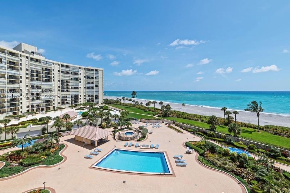 The sweeping ocean views from this 4th floor residence deliver magical mornings, enchanting evenings, and full days of wonder. Offering 2 bedrooms and 2 full bathrooms, Unit 406 provides the coastal comforts of a sleek, gated beachfront community with pools, fitness, saunas, tennis, trails, garage parking, and security. Just steps away from all the exciting entertainments of abundant nature, local cuisine, eclectic shops, fine salons and spas, 18-hole golf, marinas, and luxury theatres.