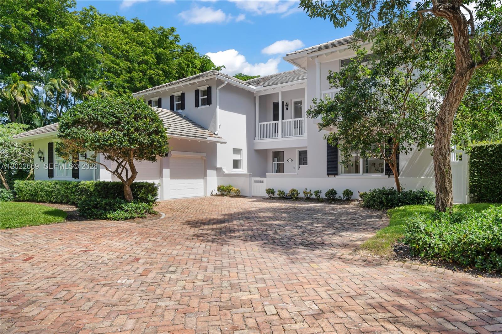 Rare opportunity in the highly sought-after gated enclave of Parkside Village, where homes rarely become available. Backing directly onto Dante Fascell Park with no rear neighbors, this beautifully updated residence offers exceptional privacy, lush green views, and a serene park-side setting between Coral Gables and South Miami. Functional and highly desirable floor plan featuring 4 bedrooms and 4 full baths, including a first-floor guest suite ideal for extended family or visitors. Second level includes a spacious primary suite with private balcony, two additional bedrooms connected by Jack-and-Jill bath, and a dedicated DEN / Office. Abundant natural light throughout with windows in every room, including laundry and garage. Impact windows and doors, brand-new roof (2025), updated kitchen with premium appliances and Sub-Zero wine cooler. Two-car garage with built-in cabinetry, EV charger, additional refrigerator, and dedicated A/C units ideal for gym, workspace, or storage. Easy to show with notice.