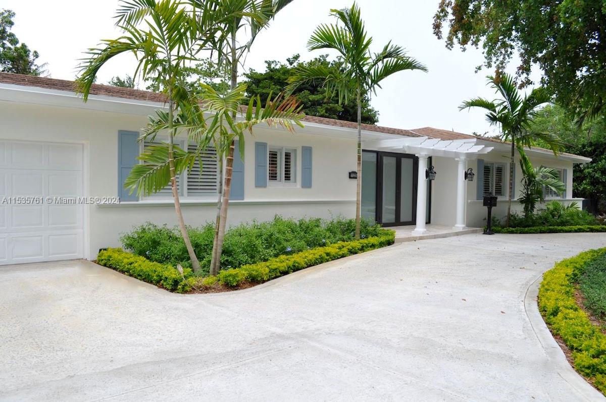 Rare opportunity in Pinecrest on a quiet tree lined street. This stunning, updated home has superior finishes throughout. Family room overlooking pool and patio with complete privacy, master walk-in closet, wood and marble floors, and upgrades galore. Open and bright rental home with exceptional schools and desired location. All impact windows and doors.  Per building plan, Living Area = 2,034, Adjusted = 2,406