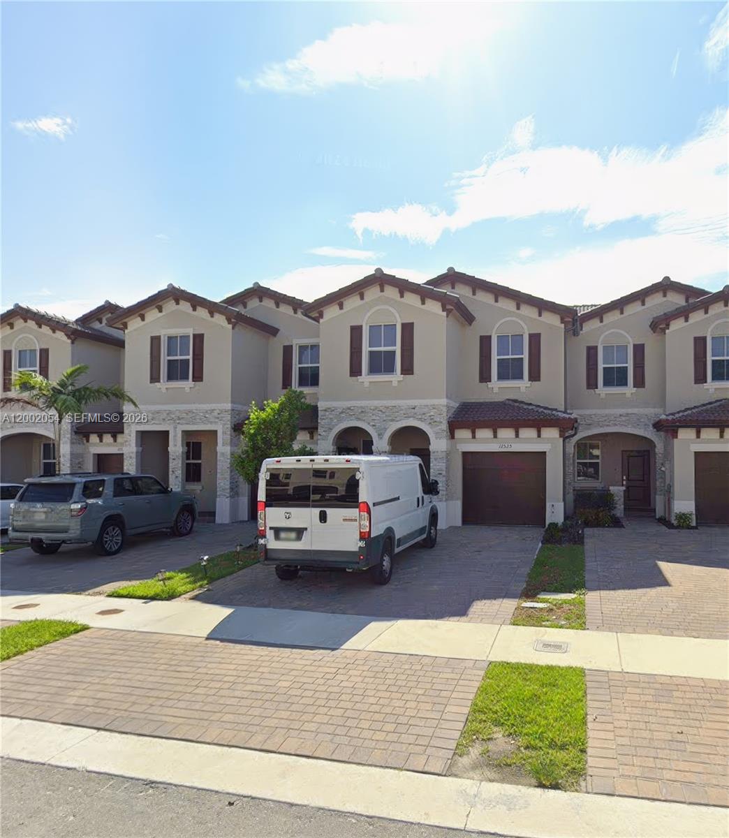 Modern townhouse in the desirable Westview community featuring 3 bedrooms and 2.5 bathrooms. Open-concept layout with a contemporary kitchen, quartz countertops, and stainless steel appliances. Enjoy a private patio with beautiful lake views. Spacious primary suite with walk-in closet, plus in-unit washer and dryer. Community offers resort-style amenities including pool, clubhouse, and fitness center. Conveniently located near major highways, shopping, and dining.