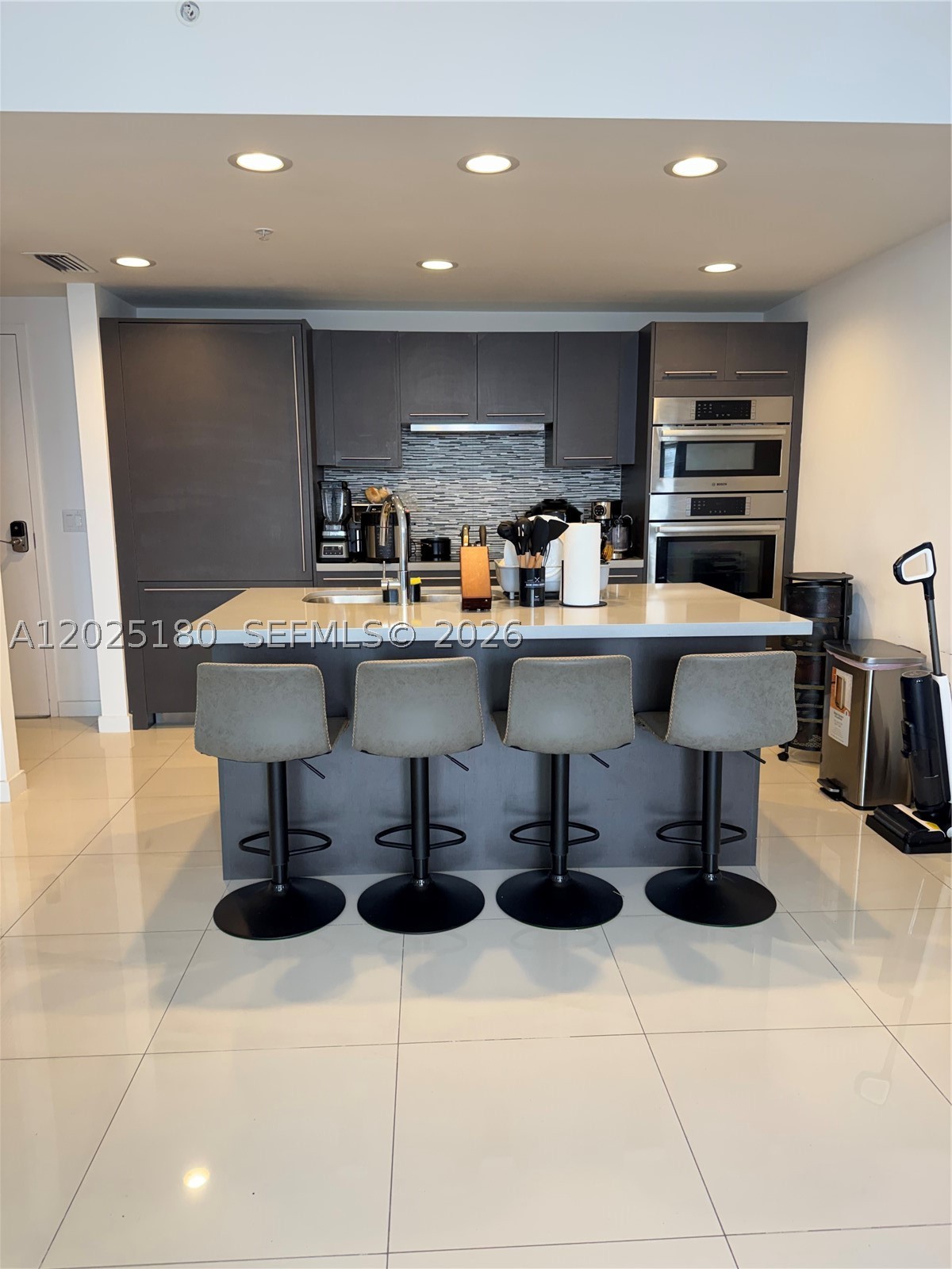 BEST DEAL IN THE BUILDING! Don’t miss this exceptional opportunity to own one of the best-value residences currently available at Midtown Doral. This spacious 1-bedroom, 1.5-baths condo offers 686 sq. ft. of comfortable living space with a smart and functional layout, perfect for everyday living or entertaining. The residence features a modern open European-style kitchen with Bosch appliances, floor-to-ceiling European cabinetry, a convenient center island, porcelain floors throughout, and a large east-facing balcony with open views ABOVE the parking structure.
Ideally located just steps from the community clubhouse, residents enjoy resort-style amenities including a large pool, sauna, amazing gym, steam room, Pilates studio, spinning room, ballroom, private rooms, spa, bar, and more. Conveniently situated near top schools and only 5-min walk to major grocery stores, shops, restaurants, banks and pharmacy stores. Easy access to main roads and major highways. Unit includes one assigned parking space. Schedule your showing before it’s gone!