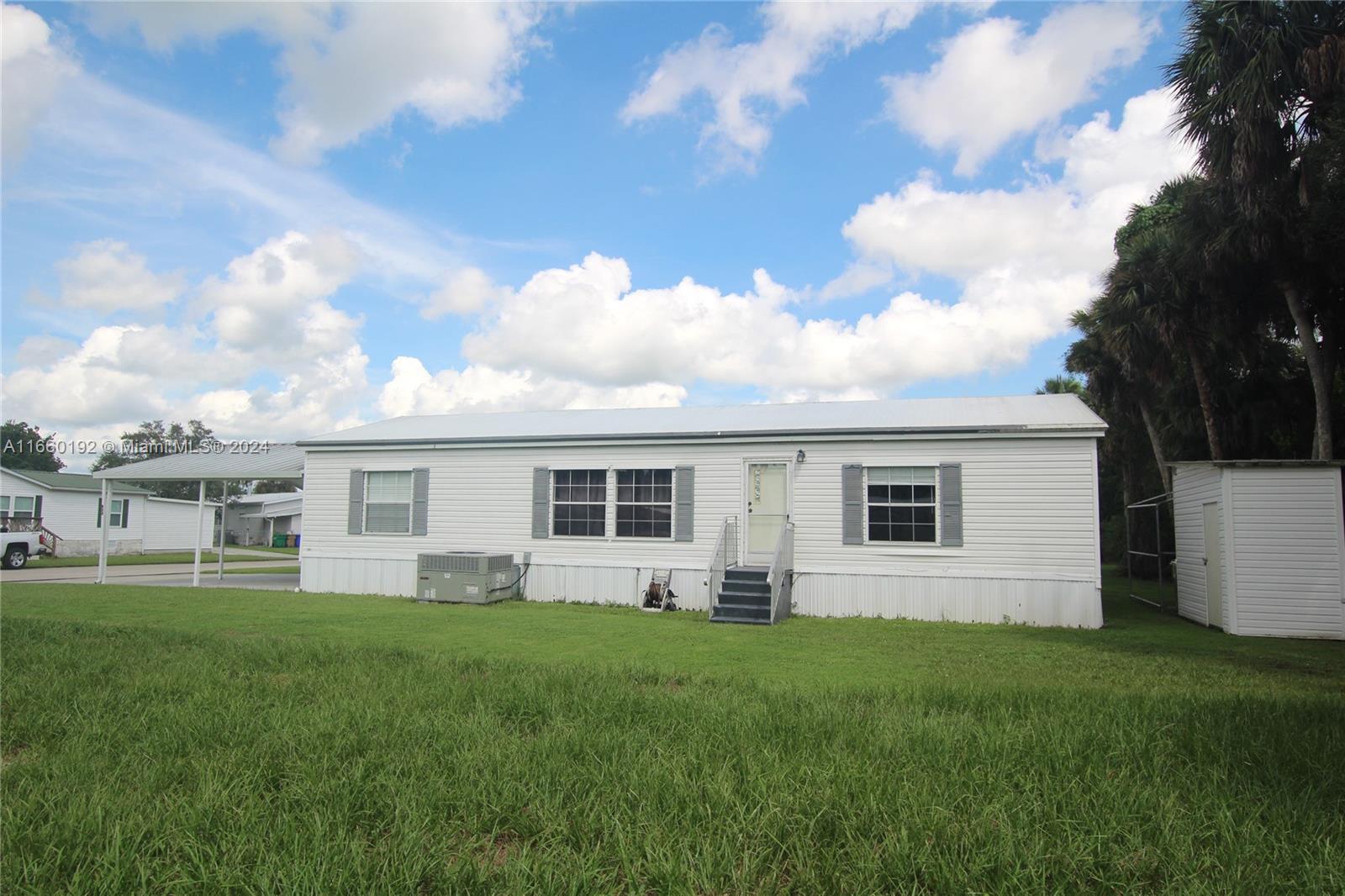 DW 3/2 Pristine Home, 2012 Lifetime Metal Roof, 2023 New A/C, 2023 Viny Waterproof Plank lifetime, Newer Main Bathroom, Tie downs good, 2023 New garbage disposal and faucets, three walk in closets, 2 Car carport. This home is on the first responder so you will be first to get power.