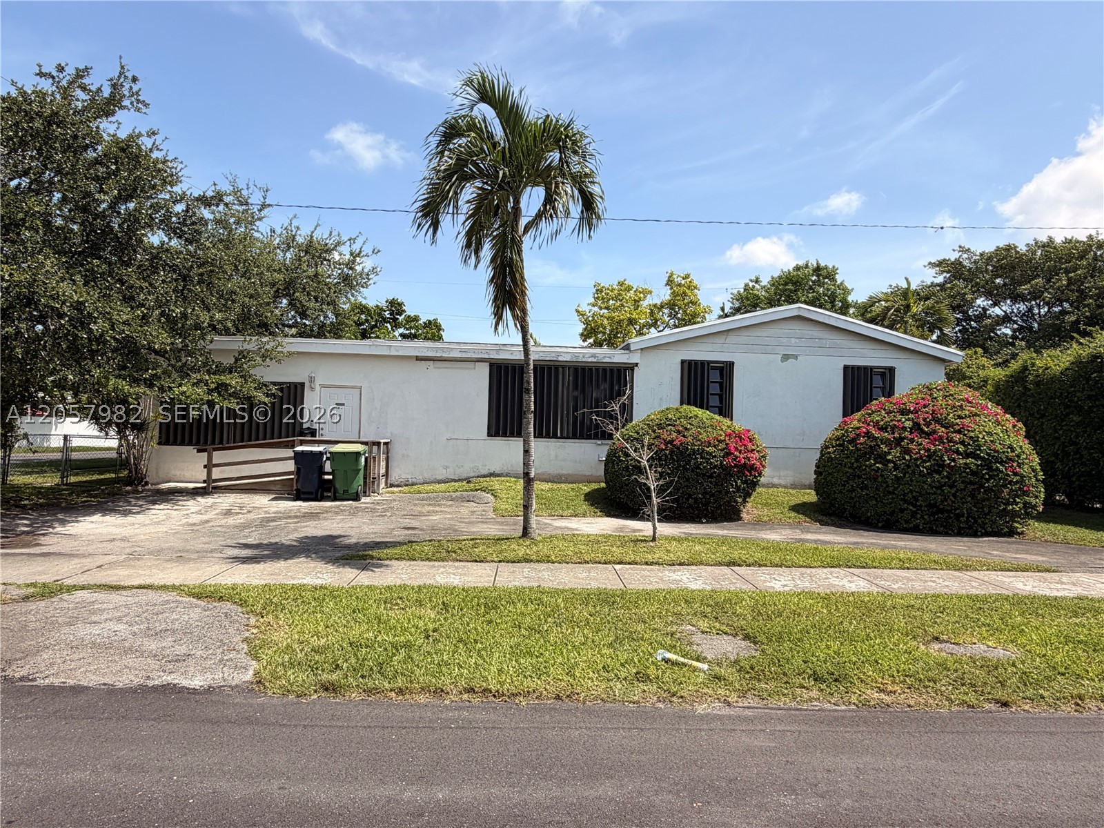 Investor or handyman special - 1,955 sq ft, solid structure- full rehab with endless potential. Perfect for buyers ready to renovate and create their vision- very desirable area. 3/3 with possibility for rental income or a 4th bedroom.