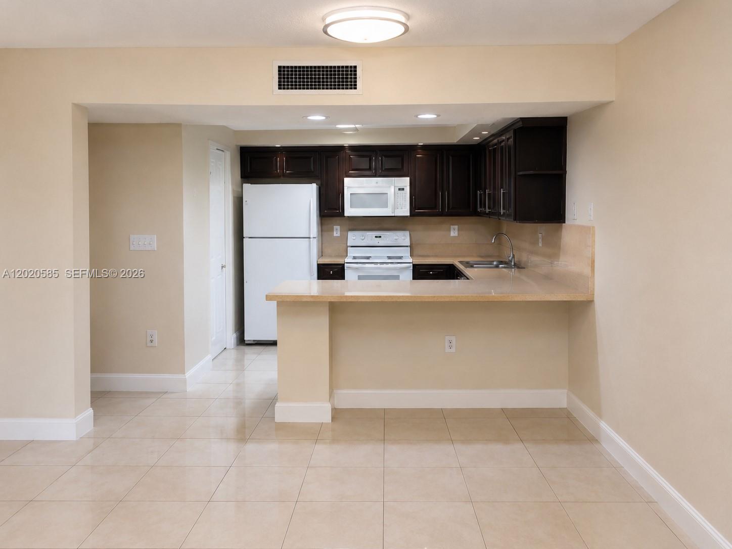 Excellent investment opportunity in the heart of Kendall! This 2-bedroom, 2-bath condo offers great potential for investors seeking immediate rental income and long-term appreciation. The unit is currently tenant occupied, making it an ideal turnkey investment property. Conveniently located near major highways, shopping centers, restaurants, schools, parks, and public transportation. Functional layout with spacious living and dining areas, abundant natural light, and a private balcony. The property is in original condition and presents an excellent opportunity for a new owner to renovate, update, or maintain as an income-producing asset. Community offers a convenient lifestyle in a well-established residential area. Low maintenance and strong rental demand make this a solid addition to any investment portfolio. Please do not disturb tenants. Showings by appointment only.