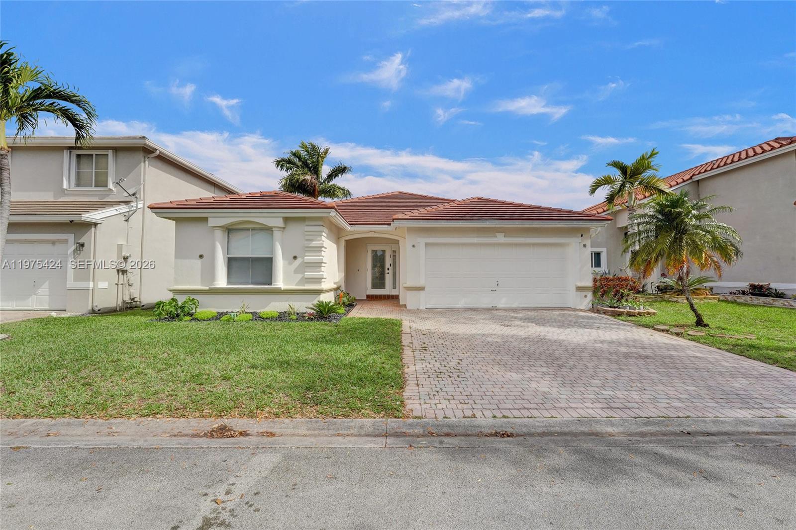 Fully renovated 3-bedroom, 2.5-bath home located in the gated community of Oakridge. This beautifully updated property features the potential for a 4th bedroom by converting the Florida room, offering flexible living space for families or guests. Half of the home is equipped with impact windows, along with a brand-new roof, new gate, and new 9-foot interior doors that enhance the modern design. The exterior boasts new turf for low-maintenance outdoor living. Situated in a secure, gated community with convenient access to major highways, shopping, dining, and the airport, this move-in-ready home offers comfort, style, and great potential.