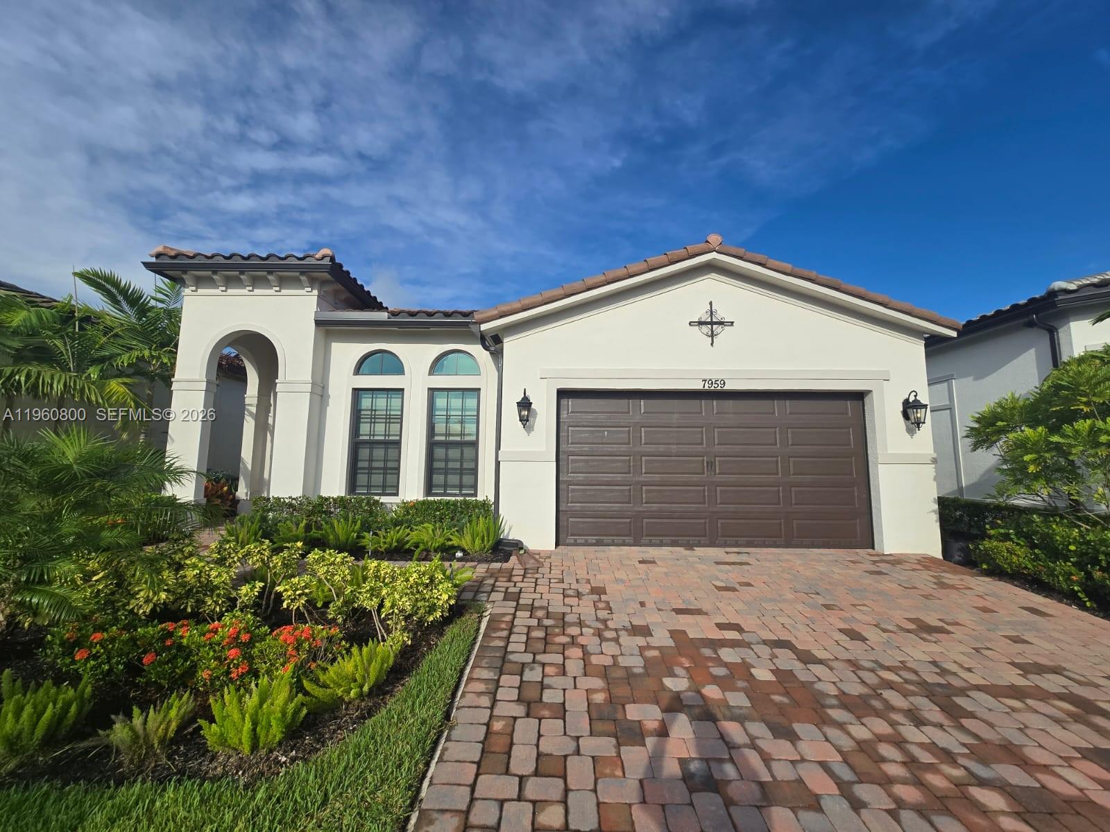Gorgeous move-in ready home available in The Falls (55+ gated community) w/in prestigious Parkland. This spacious Antigua Grande Spanish Model is 2,709 +/- FT & had $70,000+ worth of builder upgrades/improvementsPLUS all furniture is included. This home has 3 bedrooms & 2.5 bathrooms. One bedroom is currently used as anoffice. Spanish elevation, gorgeous kitchen w/ white wood double stacked cabinetry, modern quartz countertops,French doors, gas cooktop, large island, huge walk-in pantry, laundry complete w/ cabinetry, high ceilings, tilethroughout home. All appliances are less than 2 years old. Large patio w/ partially fenced backyard & tropical lushlandscape. The Falls is a luxury active 55+ community featuring a 24,000 +/- FT clubhouse w/ extensiveamenities including pool.