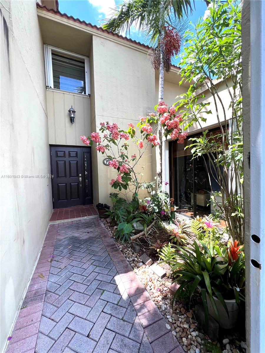 Westchester Twin Home! 2 story 3-4 bedrooms(taxroll describes as 3 Bedroom. No additions have been made tomsellers knowledge) 2.5 bath “portable” walk-in bathtub on the first floor.3/2 upstairs.Beautifully preserved and maintained home.This home is waiting for you and your family to make it your own.Formal living and dining room open to the back covered paito.Family room opens to the back patio.Welcoming landscaped atrium as you walk to the door and then the inviting foyer. Barrel tile roof 2009. Ac 2013. Minutes to FIU,Turnpike,826 hwy,, schools, airport, shopping and more! This is a twinhome with NO ASSOCIATION. Note that county records describe property as CONDO. Please speak to your lender beforehand. Its a great home in a quiet neighborhood. ALSO FOR SALE 8980 SW 8 Ter # A11602837
