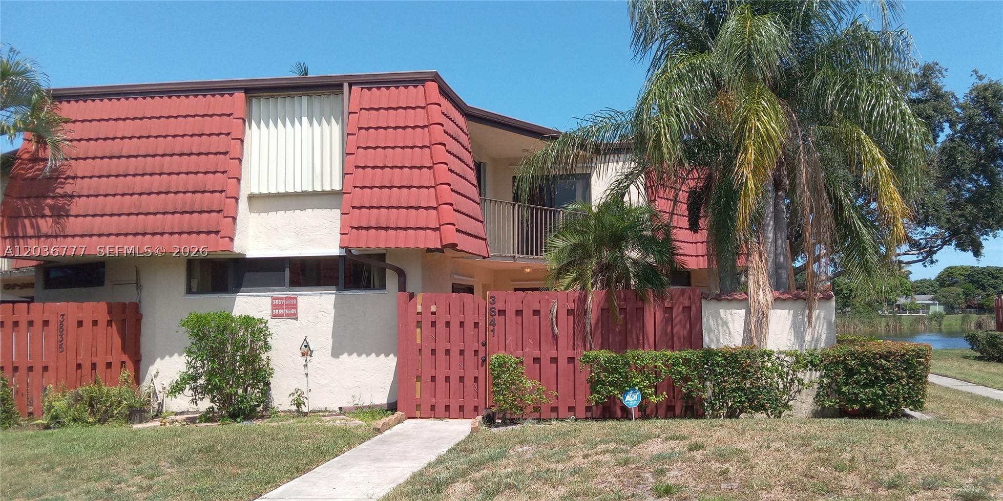 Beautiful 2-bedroom, 2.5-bath townhouse featuring a convenient half bath downstairs and two upstairs master suites, each with its own private bath. Freshly painted with new carpet, tile flooring on the first floor, and a full-size washer and dryer. Enjoy a spacious private courtyard, impact hurricane windows, and accordion shutters on the second-floor sliding glass doors. Located on a quiet end street with no through traffic, just a short walk to the community pool.