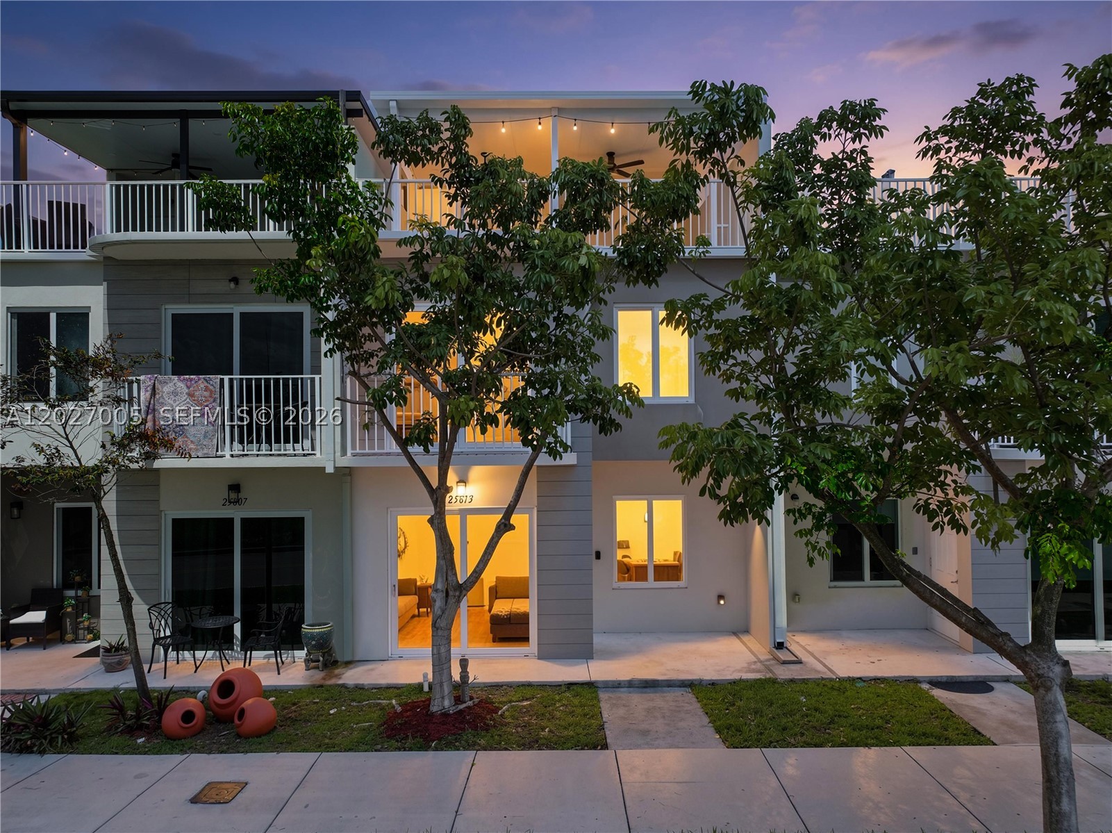 Welcome to this beautiful 2022 tri-level townhouse in the gated Redland Shores community featuring 4 bedrooms, 3.5 bathrooms, and a versatile floor plan. A desirable first-floor bedroom with a private bath is perfect for guests, in-laws, or a home office. Enjoy an open-concept living area with porcelain tile floors, impact windows and doors, stainless steel appliances, granite countertops, and modern finishes throughout. The highlight of the home is the private rooftop terrace with beautiful, relaxing views, perfect for unwinding or entertaining. Low HOA and convenient access to the Turnpike, US-1, shopping, dining, schools, and parks. Enjoy the 3D virtual tour! May your best start here!