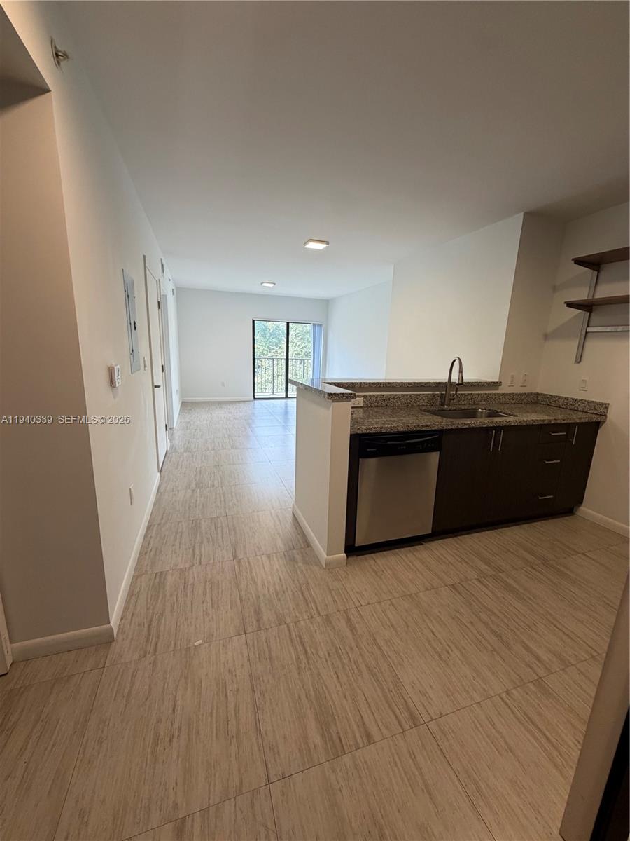 Boutique Building! Gorgeous modern apartment centrally located right off 32nd avenue and coral way. Stunning 1 bed/ 1 bath with porcelain tile throughout. Top grade finishes, unit featuring granite counter tops, stainless steel appliances, marble bath, washer/dryer inside unit. TWO balconies! Fast approval. Pet friendly. Gated, key entry. Gym on 7th floor. 1 Assigned Garage parking. Water included. Maintenance personnel onsite. Easy to show.