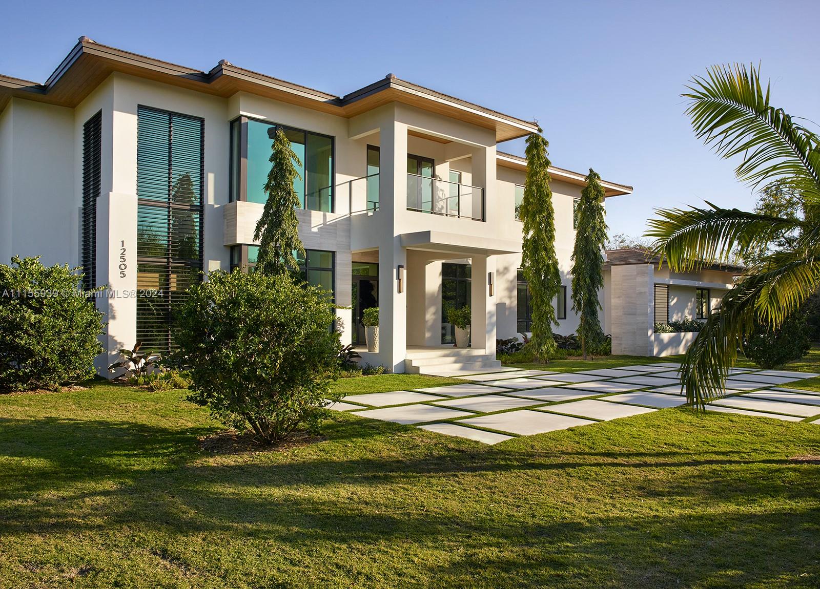 Turnkey Florida modern new construction by award winning Hollub Homes, on an idyllic Pinecrest street w/ a perfect blend of timeless sophistication and legendary quality--completed JANUARY 2024. The extraordinary custom design, expansive floor plan and luxurious finishes combine to create the perfect S. FL retreat, featuring 7 bedrooms, 8 baths (including guest house) 5 car garage! Wonderful indoor and outdoor entertaining areas with bar and great room custom built-in. Gourmet dream kitchen with Wolf/Sub-Zero. Grand primary suite; flex spaces for media, gym, office; upstairs loft; elevator. Resort style patio & summer kitchen. Fabulous 973 SF guest house. Generator. Completion: Summer 2023