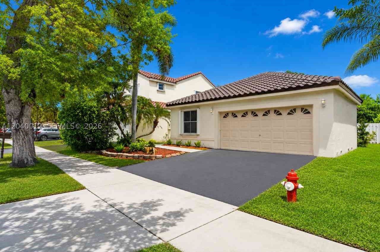 Welcome to this super inviting 3/2 home in The Lakes, on a quiet cul-de-sac. You’ll love the high ceilings, open layout, and all the natural light. The home has a NEW ROOF, new floors, and an incredible remodeled kitchen with white cabinets, stainless steel appliances, a big island, and gorgeous modern finishes. Step outside to a screened wood patio and a fully fenced yard, perfect for relaxing or entertaining. This home is updated, bright, and beautiful. Hurry, this opportunity will not last!