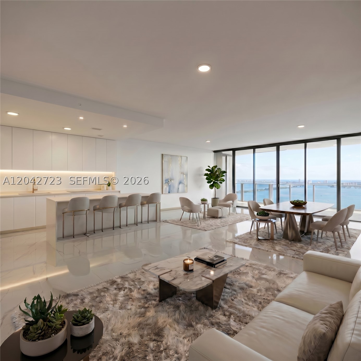 1 of only 10 Sky Villas! A grand 3,670 SF 4BD + flexible office/den + staff quarters, 5.5BA residence crafted for scale, privacy, and elevated everyday living. Arrive via private elevator into your private foyer. Ambient lighting throughout highlights floor-to-ceiling glass and the deep 481 SF terrace, framing cinematic, unobstructed direct ocean views over Biscayne Bay and Miami skyline water views from sunrise to sunset. The primary suite delivers a spa-like retreat with open-concept bath, upgraded mirrors and lighting, plus a wraparound walk-in closet. Finished custom closets and LED-mirrors elevate every room and bathroom. Staff quarters include a window and full bath - a Sky Villa exclusive. This is living at its finest. RARE: 3 side-by-side assigned parking spaces - a $300,000 value. Elevate daily life with 2 acres of exclusive world-class amenities: 3 pools, sauna, steam and massage rooms, game room, gym, children's room, conference center, putting green, tennis/basketball/pickleball courts. Perfectly positioned in the most coveted location of Edgewater’s cultural crossroads - walk the waterfront to the opera, ballet, theater, museums, concerts, parks, games and more. Minutes from: Wynwood (2), Midtown (3), Design District (4), Downtown & Brickell (5), Miami Beach (6). Walk to Whole Foods or 2 min to Trader Joe’s.
