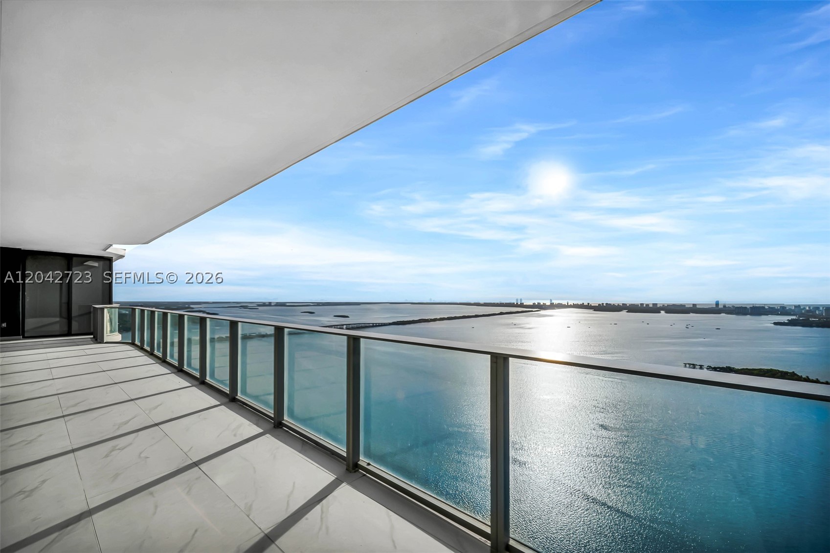 1 of only 10 Sky Villas! A grand 3,670 SF 4BD + flexible office/den + staff quarters, 5.5BA residence crafted for scale, privacy, and elevated everyday living. Arrive via private elevator into your private foyer. Ambient lighting throughout highlights floor-to-ceiling glass and the deep 481 SF terrace, framing cinematic, unobstructed direct ocean views over Biscayne Bay and Miami skyline water views from sunrise to sunset. The primary suite delivers a spa-like retreat with open-concept bath, upgraded mirrors and lighting, plus a wraparound walk-in closet. Finished custom closets and LED-mirrors elevate every room and bathroom. Staff quarters include a window and full bath - a Sky Villa exclusive. This is living at its finest. RARE: 3 side-by-side assigned parking spaces - a $300,000 value. Elevate daily life with 2 acres of exclusive world-class amenities: 3 pools, sauna, steam and massage rooms, game room, gym, children's room, conference center, putting green, tennis/basketball/pickleball courts. Perfectly positioned in the most coveted location of Edgewater’s cultural crossroads - walk the waterfront to the opera, ballet, theater, museums, concerts, parks, games and more. Minutes from: Wynwood (2), Midtown (3), Design District (4), Downtown & Brickell (5), Miami Beach (6). Walk to Whole Foods or 2 min to Trader Joe’s.