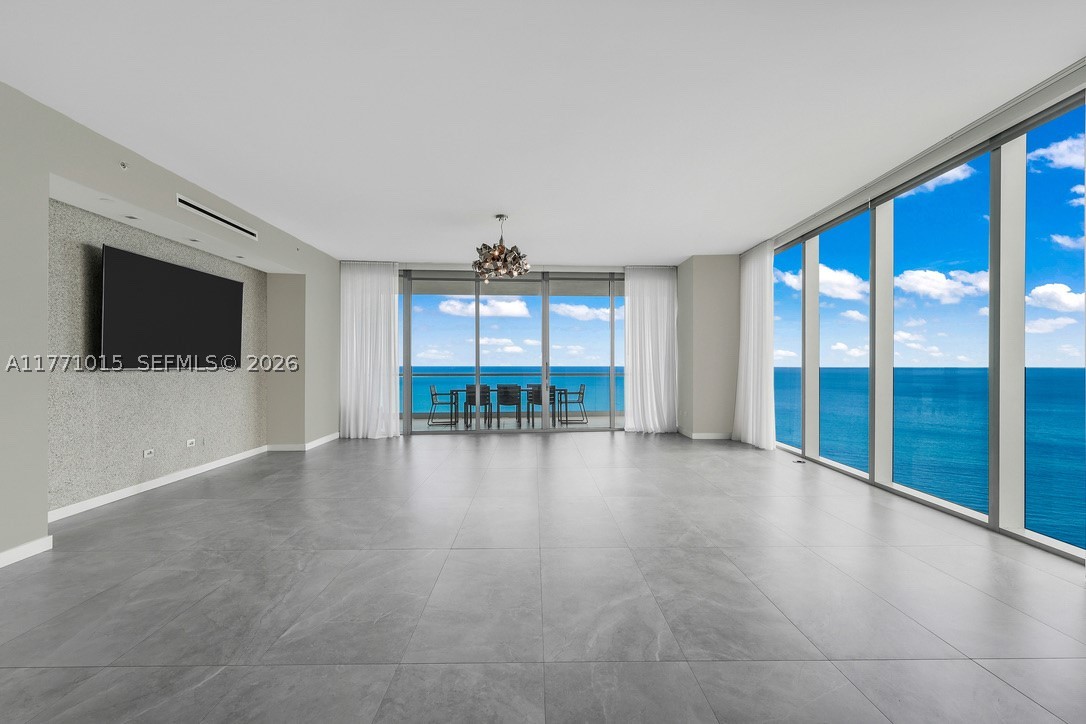 Welcome to the fabulous Turnberry Ocean Club Residence #1804, at Sunny Isles Beach. Magnificent 5 Bedrooms 5 & 1/2 Baths. Porcelain floors and walk-in closets are installed. The most desirable Southeast corner offers 180 degrees of breathtaking, unobstructed, direct ocean, Intracoastal, and skyline views, 11.4 ceiling height. Snaidero Italian custom cabinetry & stone countertops, top-of-the-line Gaggenau appliances, 11’ deep oceanfront sunrise terrace w summer kitchen+.  Turnberry Ocean Club Residences features 70,000 SF of luxury amenities & unrivaled, world-class service, including the 3-story private signature Sky Club with sunrise pool, private dining, and health/wellness spa. Indulge in a resort-style lifestyle with access to 3 restaurants, 3 pools, beach and pool service, a rejuvenating spa, state-of-the-art gym, and your own private movie theater. Every detail of this residence embodies opulence and relaxation. Embrace the serenity of oceanfront living and make this exquisite property.