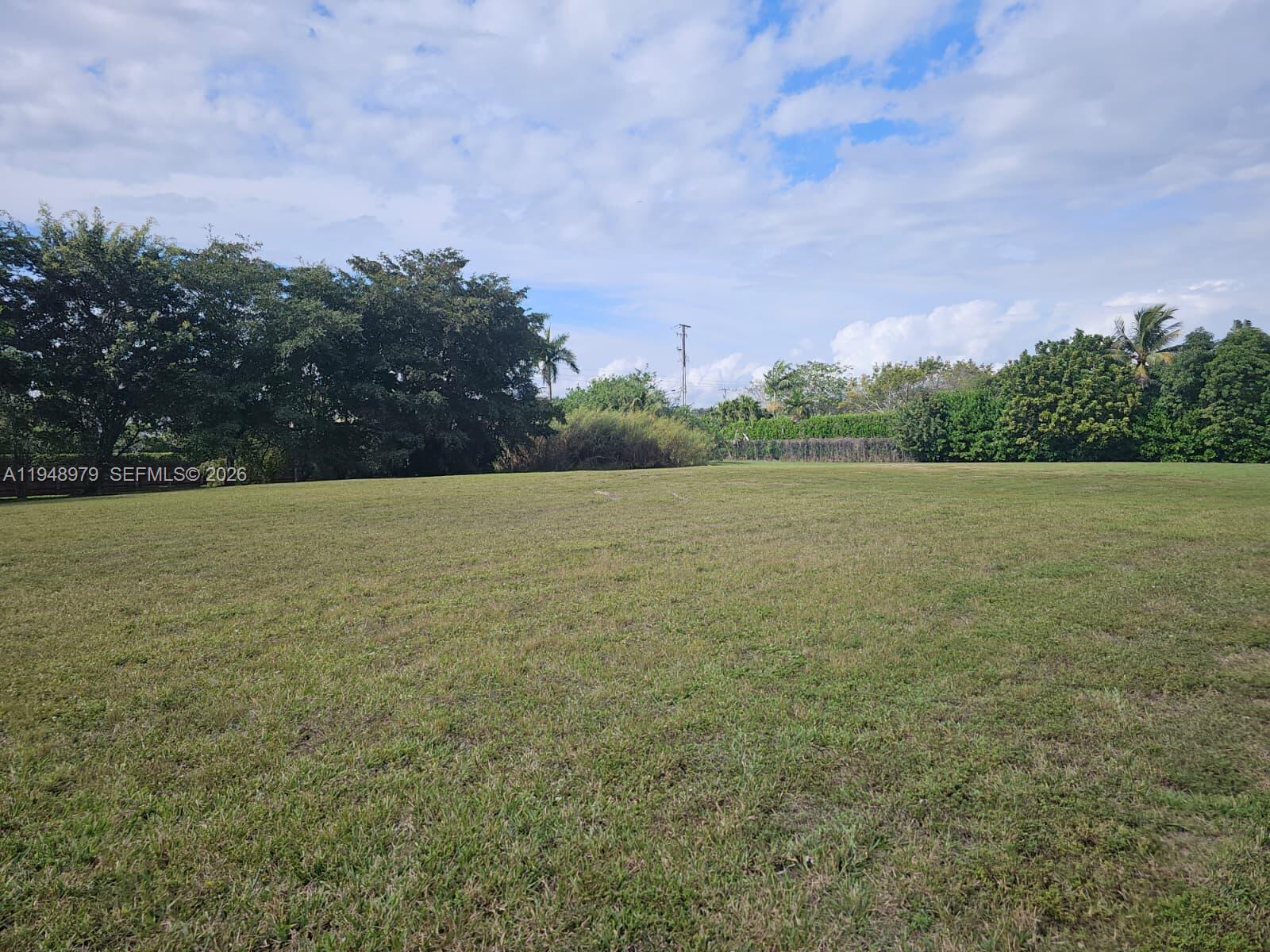 Build your dream mansion on the final vacant homesite in Stonebrook Estates, a guard-gated luxury community spanning 136 acres. This oversized 1.66-acre corner waterfront lot is the largest in the neighborhood. HOA-approved architectural plans are included for a two-story estate with 8,094 SF under air (13,902 SF total), with elevator, 6 bedrooms, 8 baths home theater, gym or 7th bedroom, laundry on both floors, resort-style pool with sunken lounge and bar, covered outdoor kitchen, sports courts, private soccer field, minigolf and six covered parking spaces or you can design your own home. Soil test and survey completed. Community amenities include clubhouse, fitness center, tennis, pickleball, basketball, volleyball courts, walking paths, and playground.