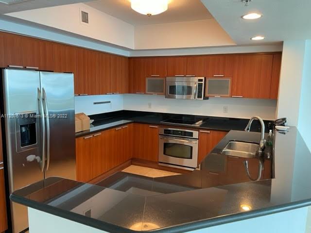 THE OAKS I CONDO - Residential Lease