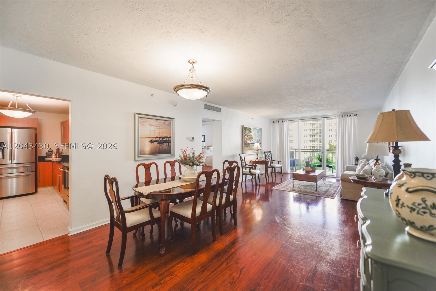 Bright 1-bedroom, 1.5-bath residence at The Residences on Hollywood Beach with east exposure and ocean glimpses. Features a stylish mix of tile and wood flooring, a comfortable efficient layout, and a relaxed coastal feel. Set in a waterfront building on the Intracoastal, this condo offers an easy Hollywood Beach lifestyle close to the sand, dining, shopping, and everyday conveniences. Walk to the new waterfront Publix next door and enjoy the best of beachside living with everything you need just moments away. Great value in Hollywood Beach.