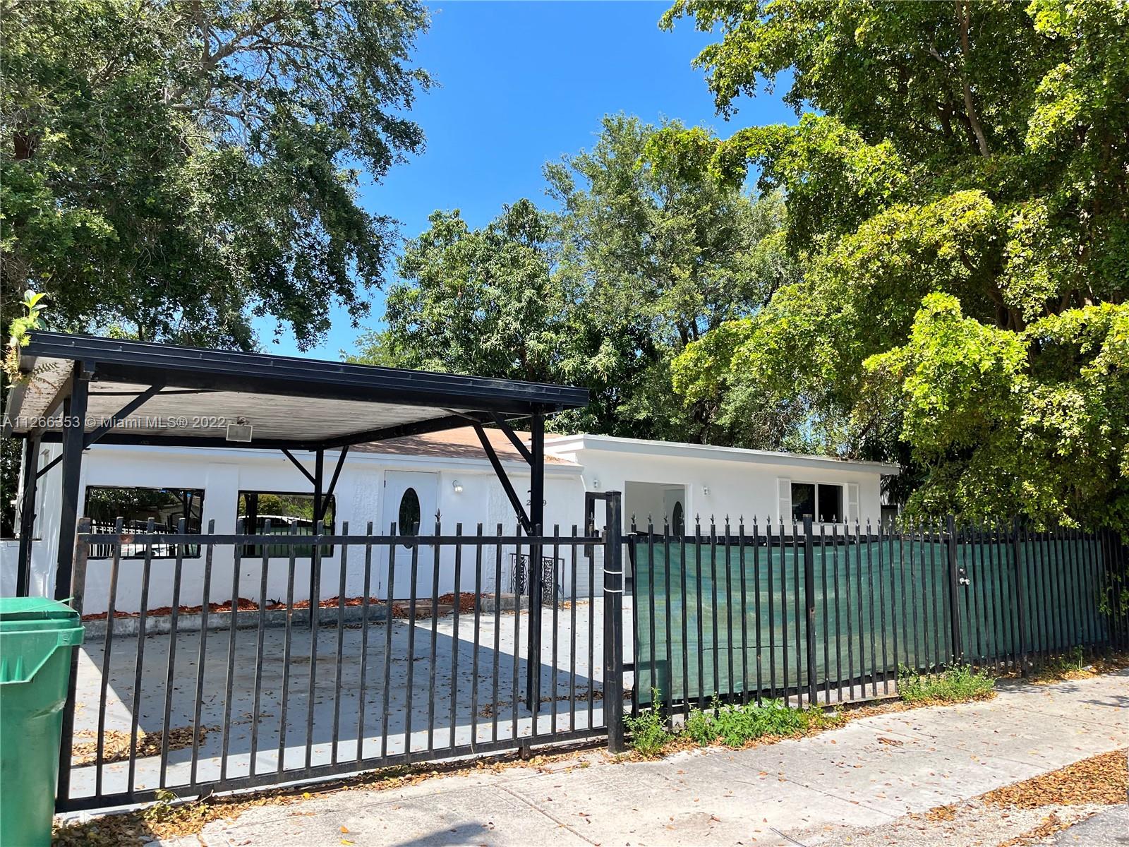 Big  3/1 + DEN and Sutido/1 with Laundry could be converter in a second bathroom in the future , Great location close to everything, two different gates for parking, new roof with permits replaced in 2022 ,new kitchen new cabinets, new floors and bathrooms, if you are an investor, these two are easy to rent it out !!!  with a return of 9 % aprox if these are rented to market price, or you can live in one side of the house and rent the other side, helping  to pay mortgage.  Big backyard to build a pool or park your boat or RV - or for big parties !!!