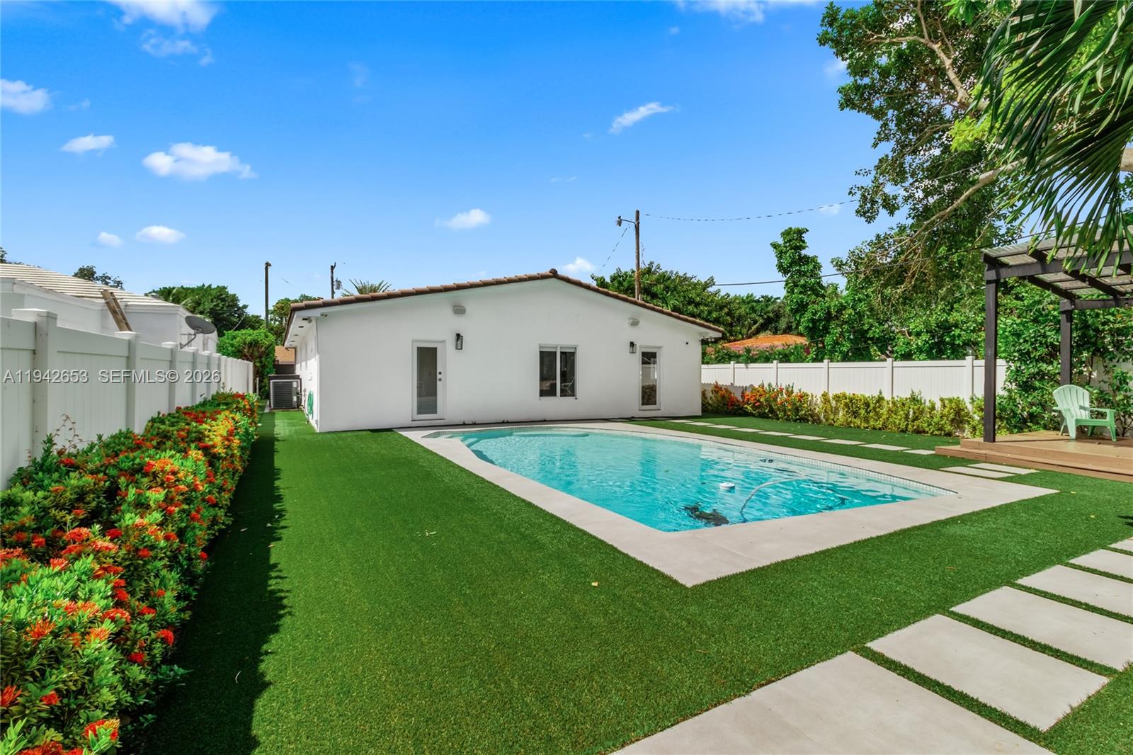 Remodeled 5 Beds / 3 Baths with backyard pool/BBQ and patio furniture. Established neighborhood in the 33134-zip code. This one-story feature has two master bedrooms with bighted-suite bathrooms, impact windows, large tiled floors, and LED lighting in an open floor plan. Perfect for a multi-generational family. The windows bring in lots of natural light. The kitchen and the bathrooms were gutted and made new on Y2020. Indoor laundry room, too. 5th bedroom can be used as a man cave, office or den too. Parking for up to 3 cars within a fenced yard, featuring electric gates. Pool area is perfect for parties & BBQ's including patio furniture and more. Coral gables Preparatory Academy, Coral Gables High School and Mater Grove Academy. Landlord is open to accept a lease with option to buy.