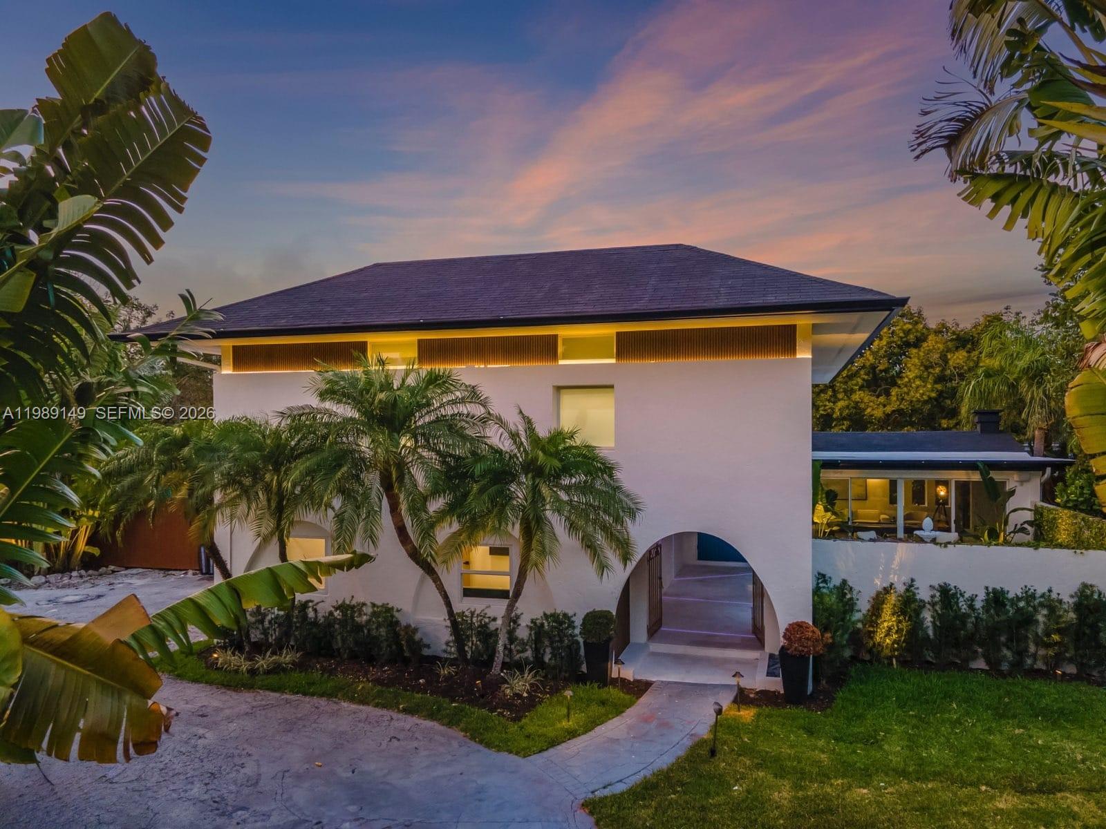This magnificent estate spans 3,402 SQFT and sits on a lushly landscaped lot of 25,401 SQFT. Featuring 6 beds
and 4 baths, with 2 bedrooms and 2 bathrooms conveniently located downstairs. Designed with attention to detail,
this home features a gourmet kitchen, a luxurious primary suite, a wine cellar, a saltwater pool, and an outdoor
kitchen. Additionally, it's a smart home with cameras, impact-resistant windows, and a driveway that
accommodates up to 10 cars. The property also offers a resort-style backyard, Tesla car charging, Sonos sound
system, camera security, pool chiller and heater, outdoor barrel sauna, Jacuzzi, and comes fully furnished.
Situated in a non-flood zone. Near private schools, shops, restaurants, and marinas. This home is a perfect blend
of luxury and functionality