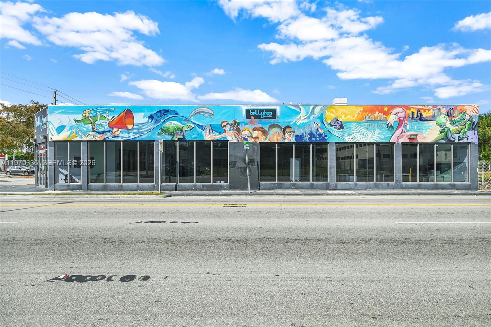 This is one of the few truly turn-key private office/flex properties delivered in this condition within the entire area. Pride of ownership is evident the moment you approach the property. While currently configured for a single tenant, the building offers significant potential for multi-tenant or co-working opportunities.
This property benefited from a full renovation in 2016, which included all mechanical systems, electrical service, plumbing, two ADA-compliant bathrooms, multi-zone HVAC, and impact glass throughout, and a  new roof in 2025.
The property is currently owned by a digital media advertising firm that purchased the building to scale their business within a bright, team-driven, open-plan atmosphere. The purchase of this asset was an integral part for this tech based start-up company to successfully grow their business, design and build its systems, and grow. . its systemsPreviously, the property served as a private collector car gallery and dealership; notably, it still retains a special warrant allowing for an automotive dealership license at this address.
The 79th Street corridor and the Little River Business District have seen enormous improvements and large capital investments over the past five years. This area is now a fully established commercial destination for dining, shopping, furniture showrooms, and sophisticated professional offices.
THIS PROPERTY IS LOCATED IN: A QUALIFIED OPPORTUNITY ZONE. A FEMA FLOOD X ZONE "AREA OF MINIMAL FLOOD HAZARD".