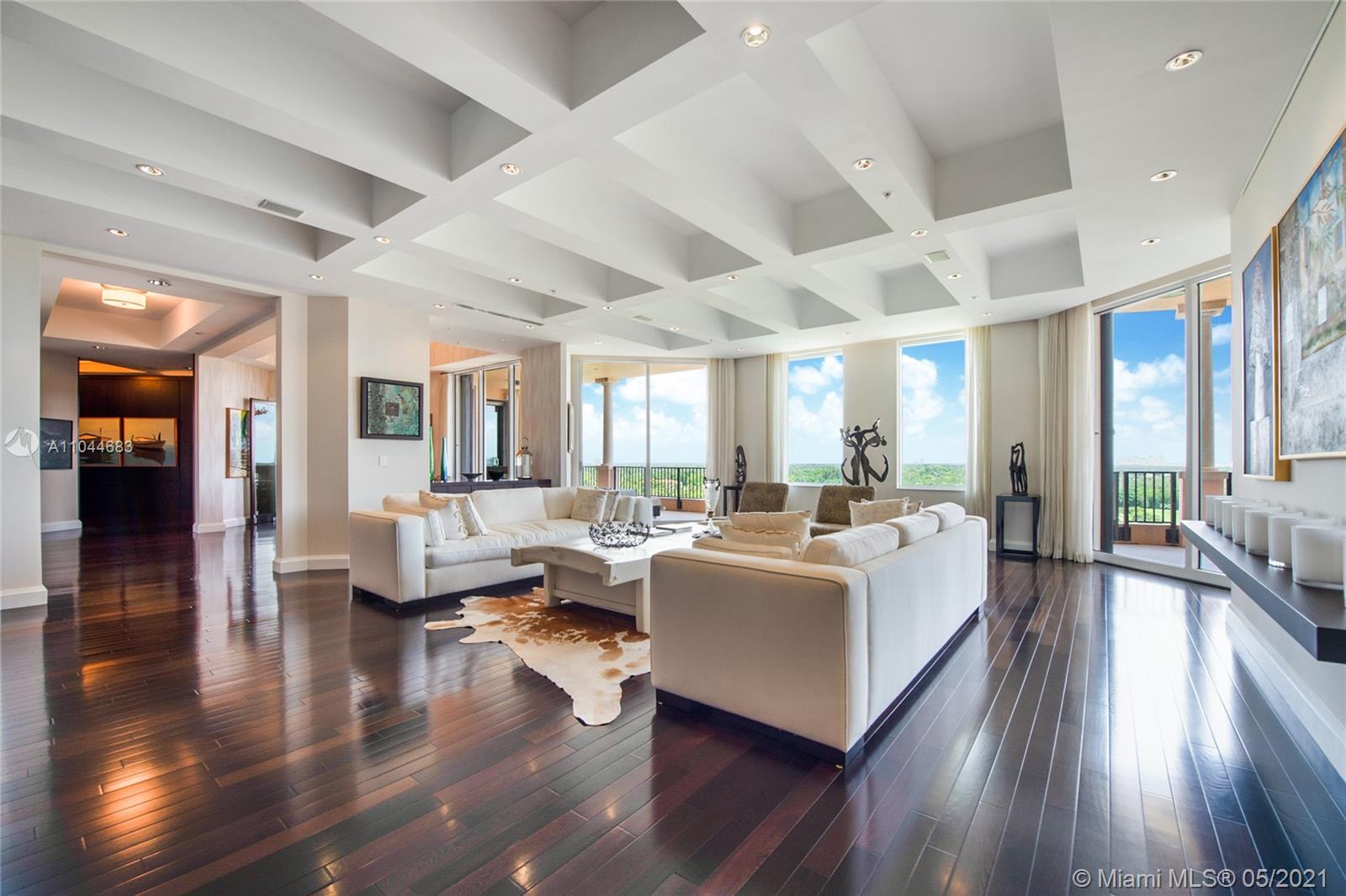 Leave the hustle and bustle of life behind and enter into the serenity of Deering Bay. In the best Building in Deering Bay, the Milano, you will find this spectacular residence. This unit has voluminous 11 ft ceilings, five large ensuite bedrooms all with walk in closets and terraces, fabulous entertaining areas,  including almost 1000 sq ft grand salon and wet bar for fun gatherings,  eat in kitchen with breakfast bar and adjacent family room, a library and office adjacent to the master, sound system ,  private 2 car parking garage and huge storage room as well as a 3rd parking space.  The oversized terraces allow for outdoor enjoyment as well.   The building has a it’s own hotel room , fitness center, pool, spa, and the only social room in Deering Bay.  Come and enjoy this home!