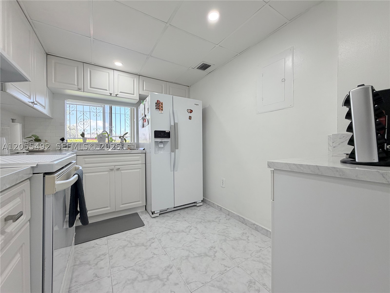 VERSIALLES GARDENS II CON - Residential Lease