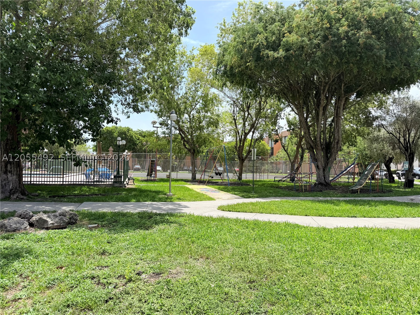 VERSIALLES GARDENS II CON - Residential Lease