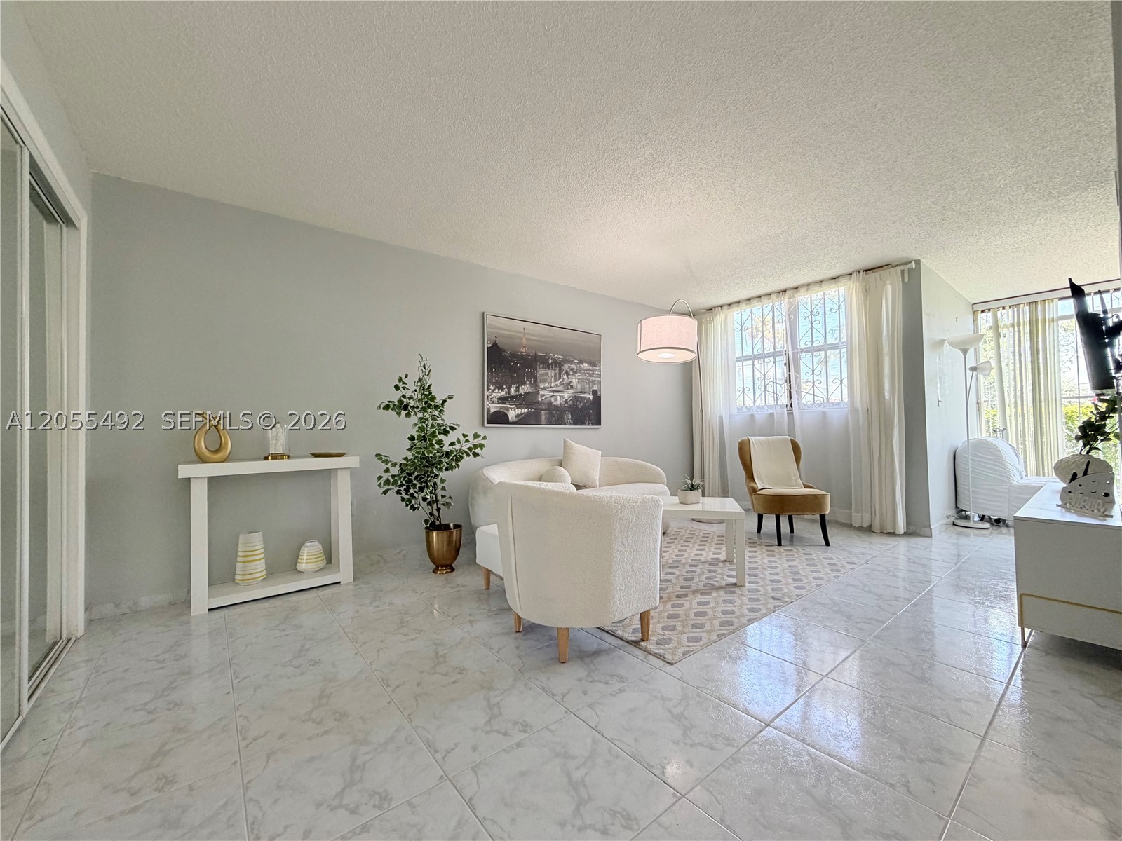 VERSIALLES GARDENS II CON - Residential Lease