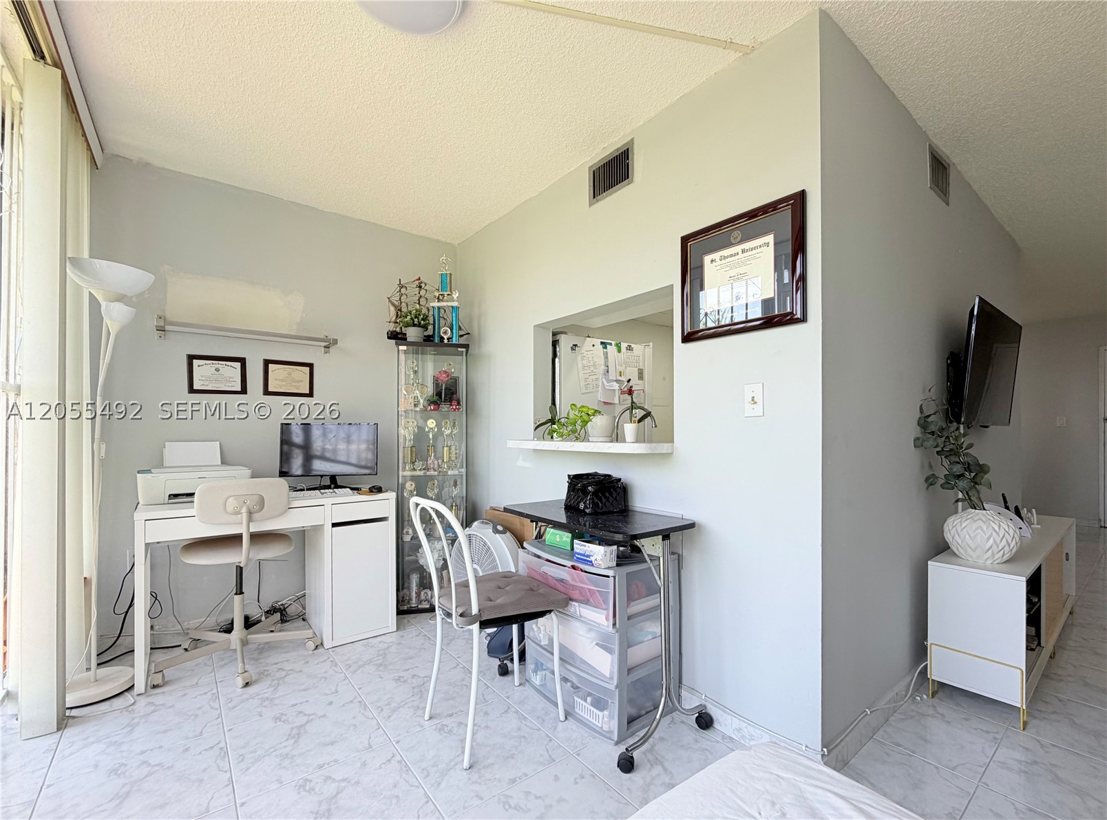 VERSIALLES GARDENS II CON - Residential Lease