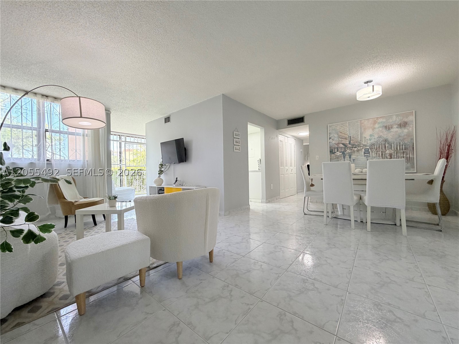 VERSIALLES GARDENS II CON - Residential Lease