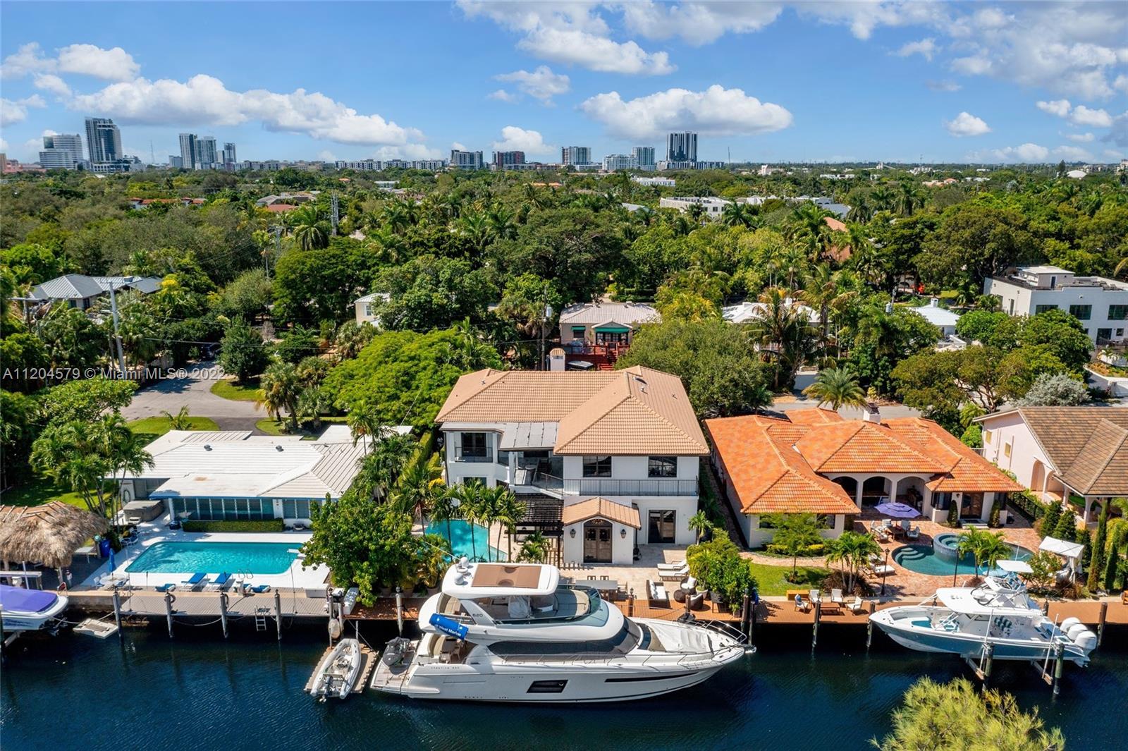 Extraordinary waterfront home situated in the very desirable Victoria Park! Welcome home to your 6 bedroom, 4 bathroom fully updated property situated on 75’ of no fixed bridge waterfront. First floor features include, chef's kitchen, restored marble flooring, custom designed resort style patio & pool, and two levels of bedroom and bathrooms. Find yourself drawn to generous size master bedroom on the second floor with morning bar, two guest bedrooms, media lounge and study. Great to entertain guests and family. Blocks from Los Olas Blvd, and minutes to the beach! Perfect property to provide endless entertainment in the heart of Fort Lauderdale.