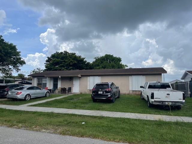 NO HOA, IN A PEACEFUL CUL-DE-SAC. WELL KEEP 4 BEDROOM, 2 BATHROOM IN A GREAT NEIGHBORHOOD. TILE FLOORS THROUGHOUT THE HOUSE, ACCORDION HURRICANE SHUTTERS, FENCE YARD, 42" TALL KITCHEN CABINETS, LARGE LOT. ONE BLOCK FROM SCHOOL, CLOSE TO SHOPPING, RESTAURANTS, ABOUT 1/2 MILES FRON THE FLORIDA TURNPIKE. IT IS A MUST SEE, PLEASE CALL FOR SHOWING APPOINTMENT.