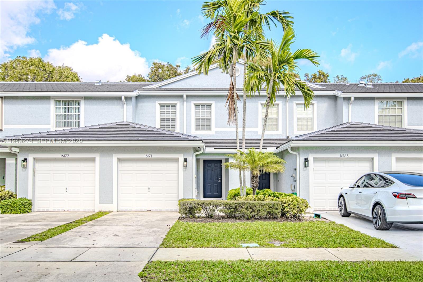 Bright and spacious 2 bedroom and 2.1 bathrooms townhouse with one car garage in the desirable gated community of Sierra Palms, Delray Beach, FL. This well maintained home features an Open kitchen and light filled living area with serene lake views, flowing seamlessly to a  private patio-prefect for the morning coffee , relaxing or entertaining. A convenient half bath is located on the main level. Upstairs offers two generously sized bedrooms, each with its own end-suite bathroom. Full size washer and dryer. Community amenities include beautifully landscaped grounds, a pool, picnic area and playground. Pet friendly community.Ideally located near shopping, dinning and medical center, with easy access to major roads and beach. Excellent school district. 
Major updated include a new roof(2025)-$21K improvement, AC(2018),water heater( 2023)