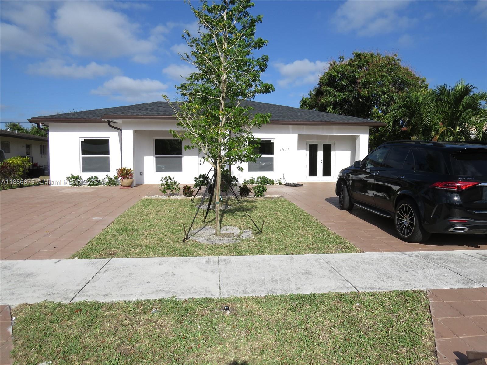 Brand-new 2024 Ft Lauderdale duplex with CBS block construction, impact windows, and high-end finishes! Spacious 2 units, 3/2, porcelain tile floors, quartz countertops, wood cabinetry, and stainless steel appliances. prime location near Hard Rock Casino, major highways, FLL Airport, shopping & schools - a perfect investment or owner- occupant opportunity in a strong rental area