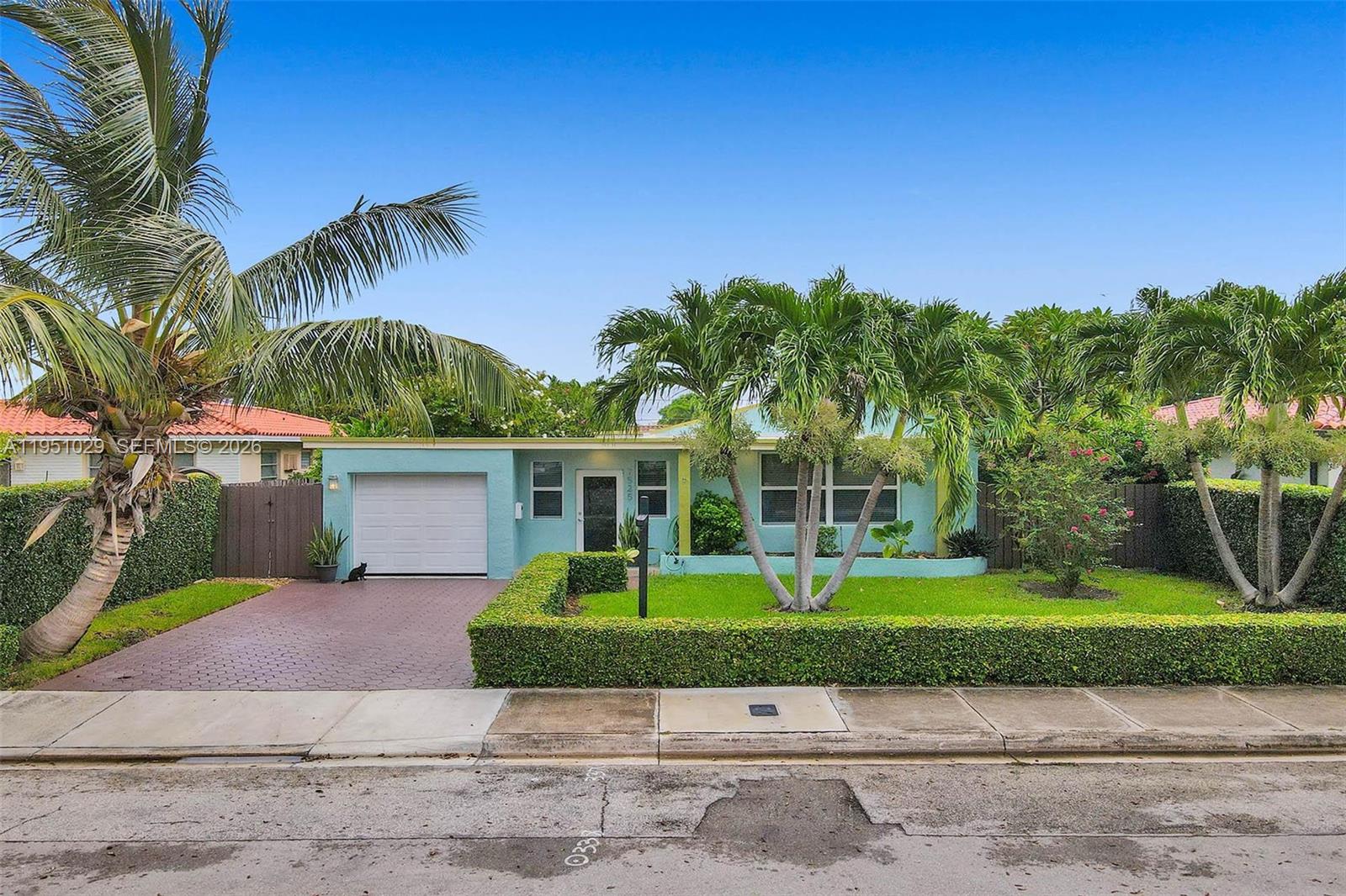 Beautiful 4 bedroom, 3 bathroom home ideally located across from Biscayne Bay in the desirable Treasure Island section of North Bay Village. Thoughtfully designed, the 4th bedroom has been combined with the 3rd to create an expansive and inviting primary suite, offering flexibility for a sitting area, office or retreat space. This residence is filled with natural light and features tile floors throughout, a paved driveway, 1-car garage and a functional layout ideal for everyday living and entertaining. Step outside to a private backyard oasis with pool, lush tropical landscaping and generous space for outdoor dining, gatherings and relaxation. Surrounded by multi-million-dollar waterfront homes, this property offers a rare opportunity to enjoy island living with long-term upside. North Bay Village continues to experience significant investment with new luxury waterfront developments enhancing the community, infrastructure and future value. Enjoy a 10/10 location with a short drive or bike ride to the beach, approximately 15 minutes to the Design District and Wynwood, and about 20 minutes to Miami International Airport. Walkable, safe and community-oriented, this island enclave offers bay breezes, sunset strolls and quick access to Miami and Miami Beach via the 79th Street Causeway. Close to waterfront dining, marinas, parks and everyday conveniences, this home is ideal as a primary residence, 2nd home or long-term investment in one of Miami’s most exciting island communities.