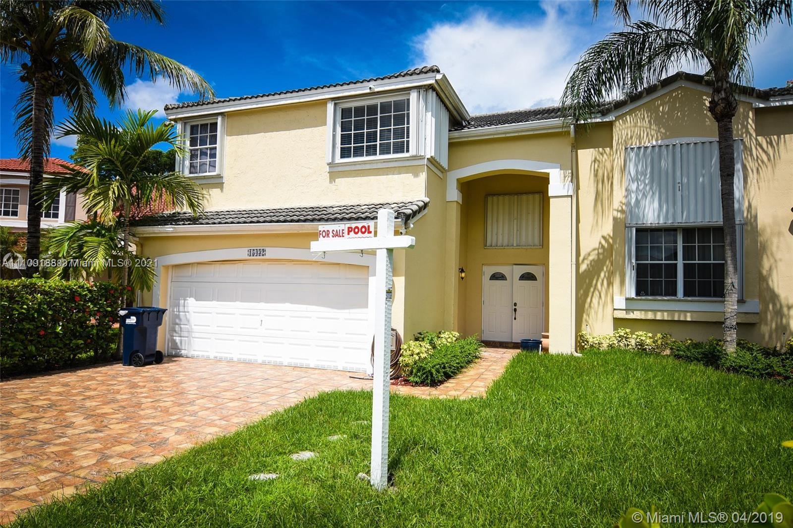 Comfortable and spacious 2 story home with 1 master and other 3 bedrooms located upstairs. Title en first floor and laminate and carpet on second floor. Roof completely renovated 6 months ago. Air conditioner 2 years replaced. Master bedroom has a 2 walk-in closets and spacious adjacent master bathroom with shower, Jacuzzi and 2 sinks. Home has high ceiling in the first floor giving it a voluminous feel and lots of natural light entering through the windows. You also have a double car garage and an ample driveway for multiple vehicle parking. The kitchen is actually remodeled and all the bathrooms too. Beautiful pool with guard for children and large yard.