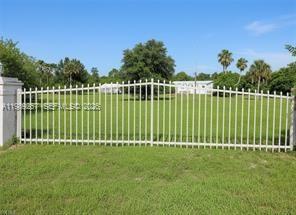 2.77 ± fenced acres featuring a 3-bedroom, 2-bath home! The property is fully fenced and gated, with a durable metal roof and a history of light use as a weekend retreat, there is also a large shipping container for storage and a carport. Zoned rural residential, it’s ideal for horses and other livestock. A perfect country escape—just about two hours from Miami or an hour from Fort Myers.