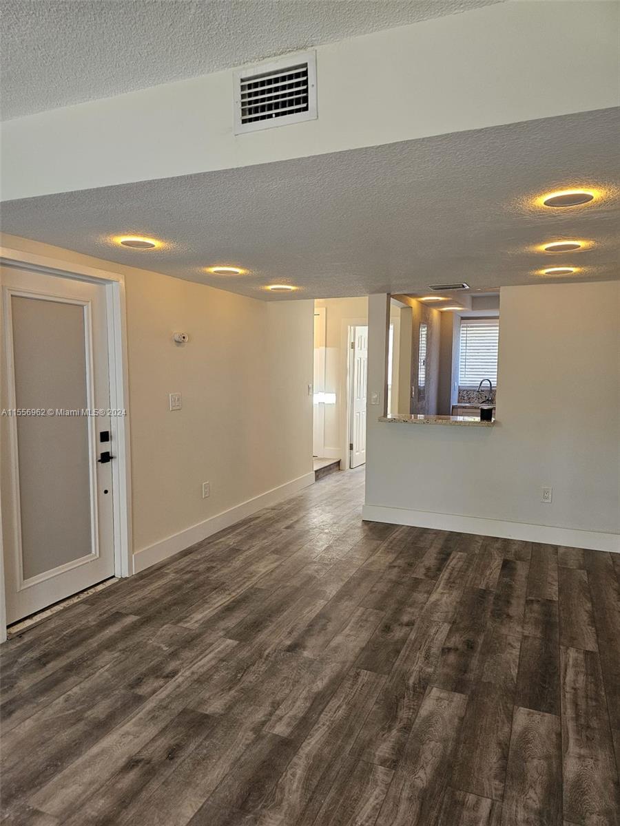 Charming two-story apartment situated in the sought-after Shenandoah neighborhood of Miami. Recently remodeled with new appliances, this cozy residence features two bedrooms and one and a half bathrooms. Centrally located between Coral Gables, Coconut Grove, and Brickell