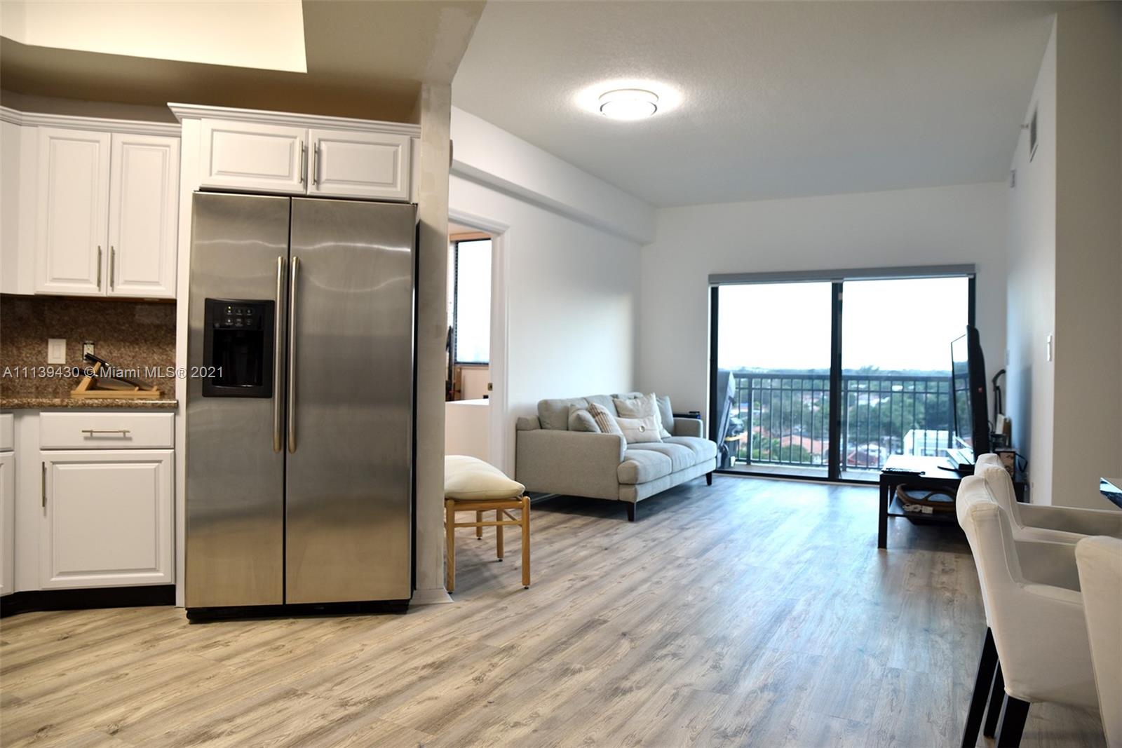 Just steps away from Miracle Mile, this 2/2 recently renovated condo has a wonderful floor plan. Large kitchen with granite counter tops, wood cabinetry, & a large pantry. Master bedroom comes equipped with a sitting area, large walk in closet with custom cabinetry, & marble bath with bidet. Brand New Tiles throughout the unit. This unit includes 2 assigned parking space in a secure garage which is very rare. Building amenities include fitness room, business center and a pool.