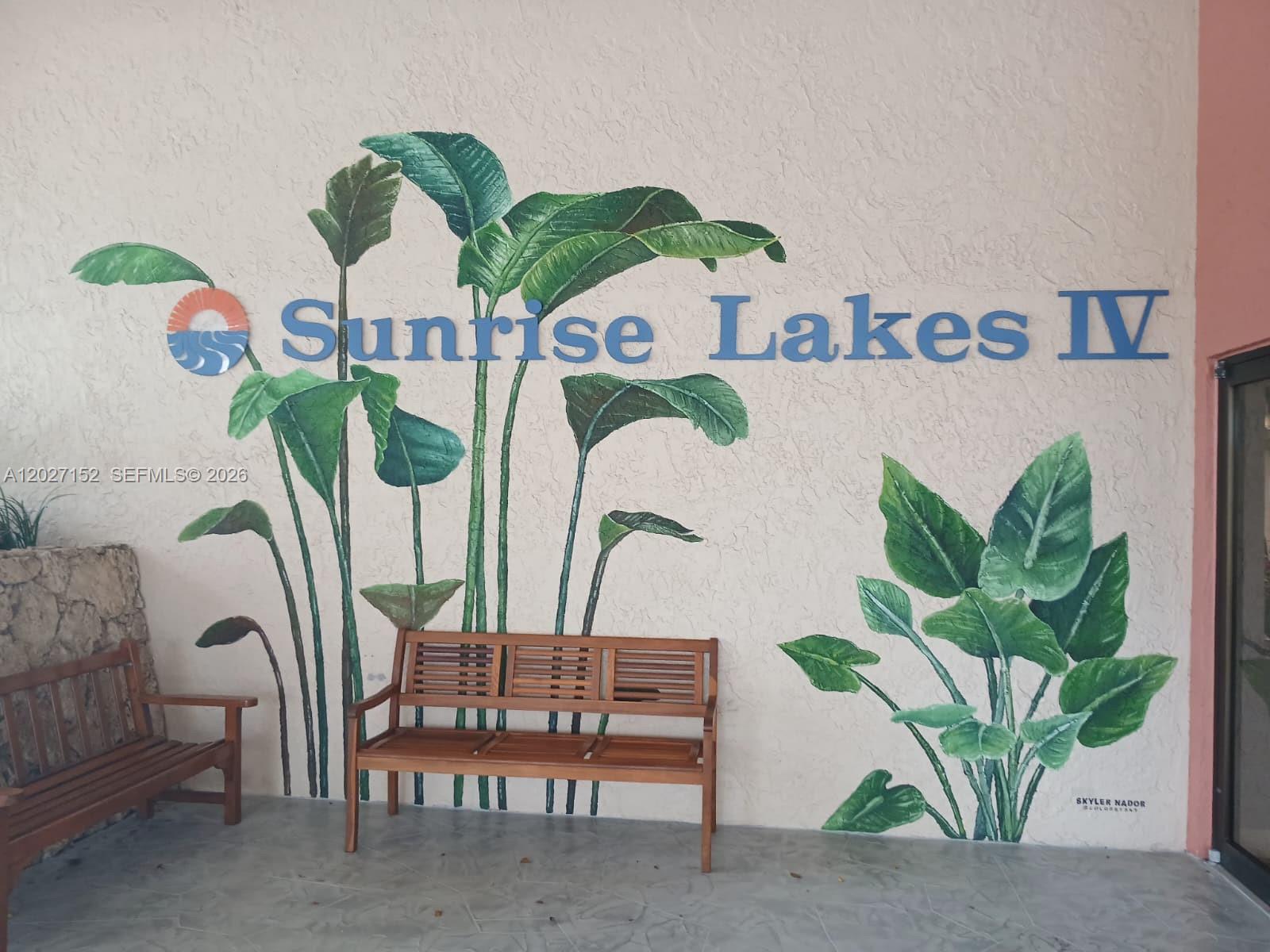 Spacious and beautifully maintained waterfront 3-bedroom, 2-bath first-floor corner unit in the desirable Sunrise Lakes 55+ community! This bright and inviting home features new tile flooring throughout, an updated kitchen with oversized cabinetry and stone countertops open to the dining and breakfast area, plus a dedicated laundry room with full-size washer and dryer and additional storage conveniently located outside the unit. The oversized primary suite offers an XL walk-in closet and serene water views. Extra windows throughout the corner unit fill the home with abundant natural light while showcasing peaceful garden and waterfront views. Enjoy the safety and tranquility of this well-maintained community, offering an impressive variety of amenities including game rooms, live shows and events, clubhouse activities, and a massive movie theater.